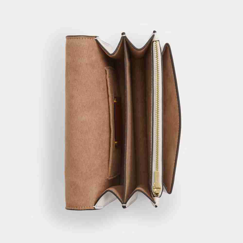 Mini Klare Crossbody Bag In Signature Canvas