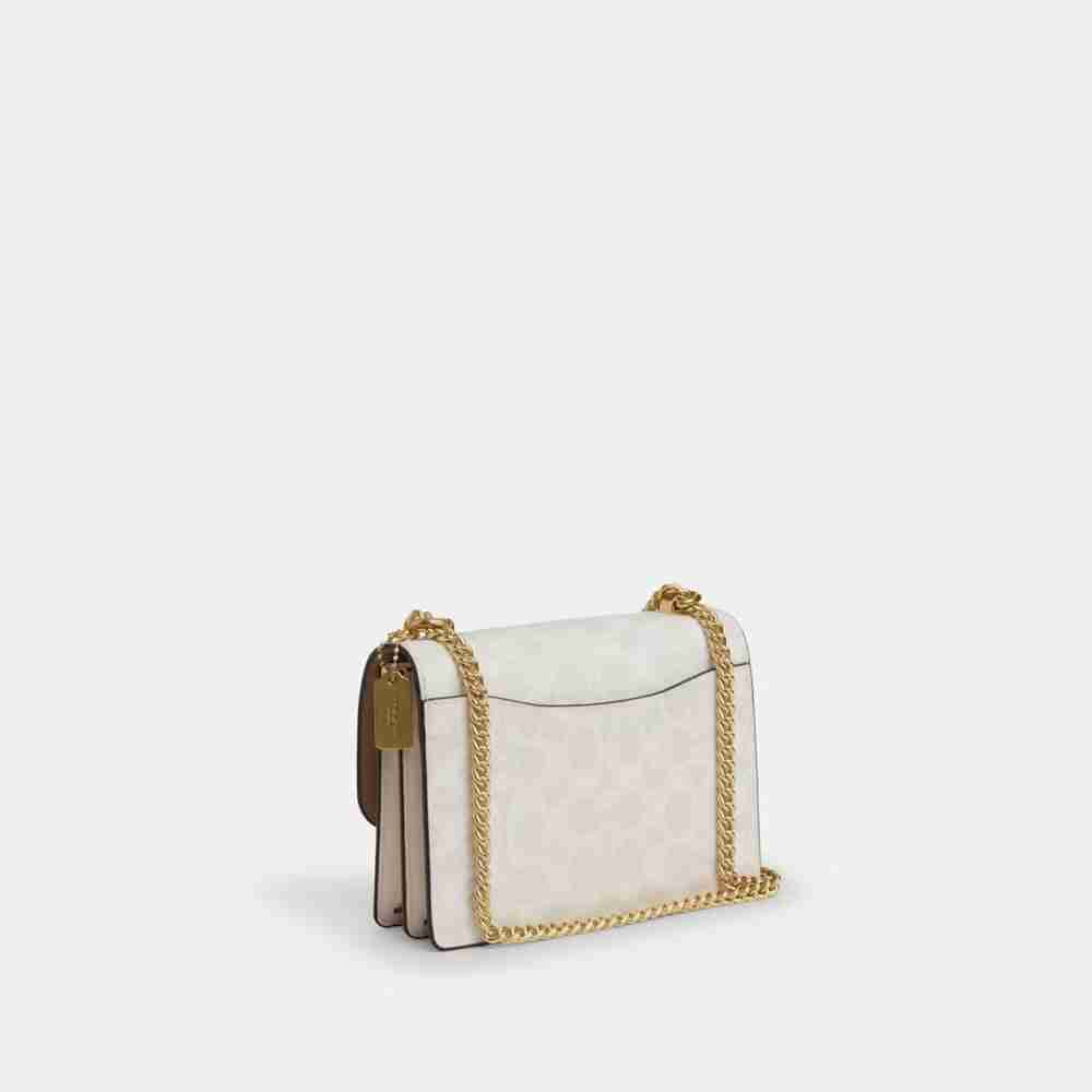 Mini Klare Crossbody Bag In Signature Canvas