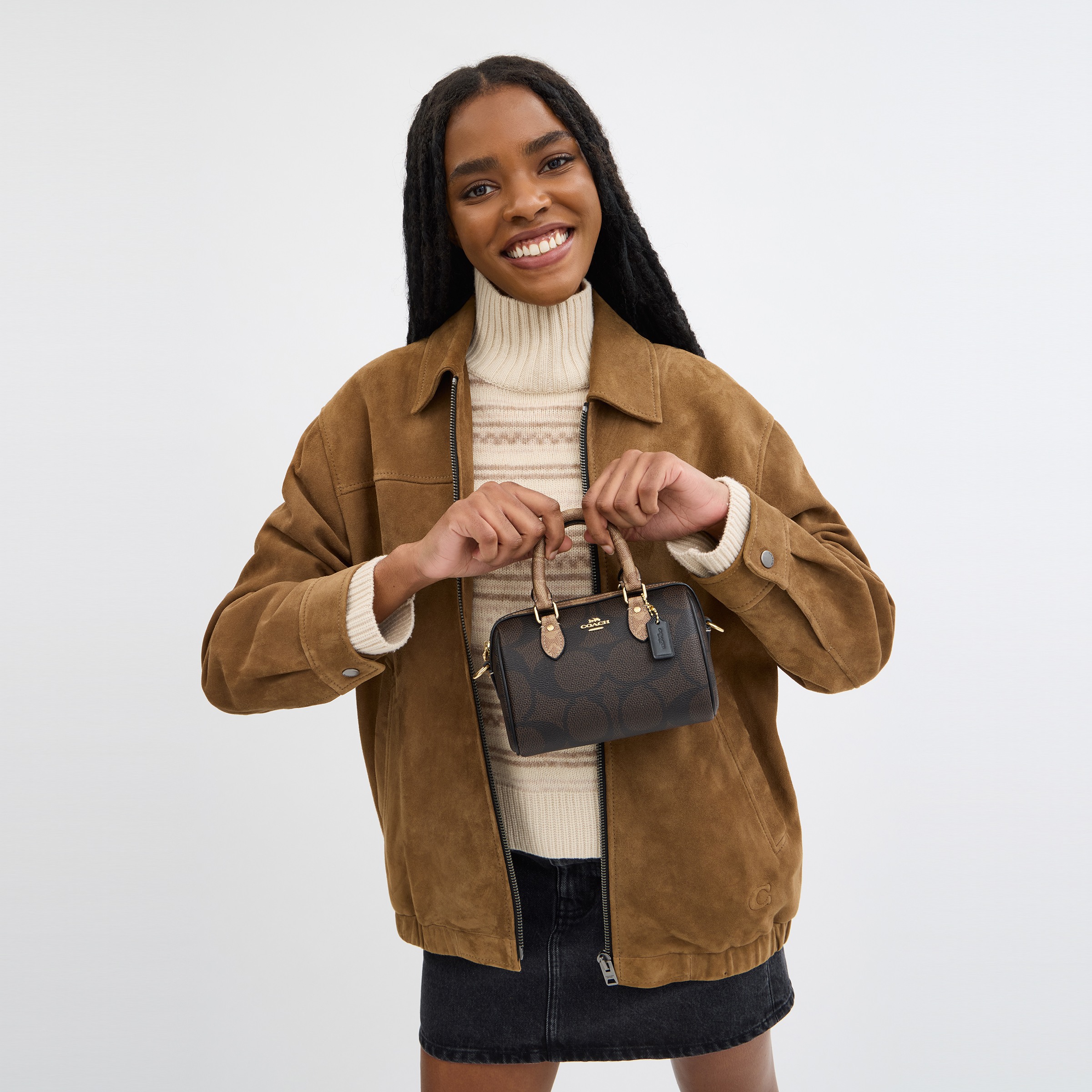Mini Rowan Crossbody Bag In Blocked Signature Canvas