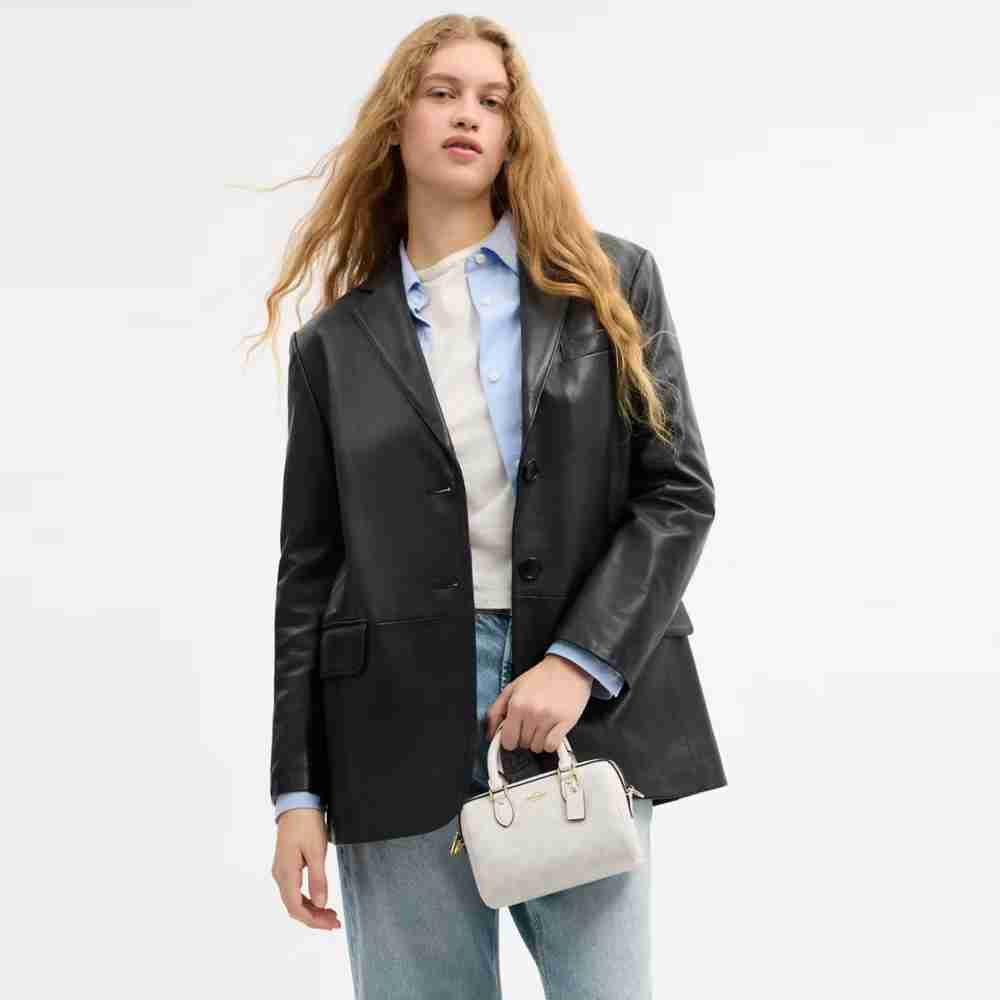 Mini Rowan Crossbody Bag In Signature Canvas