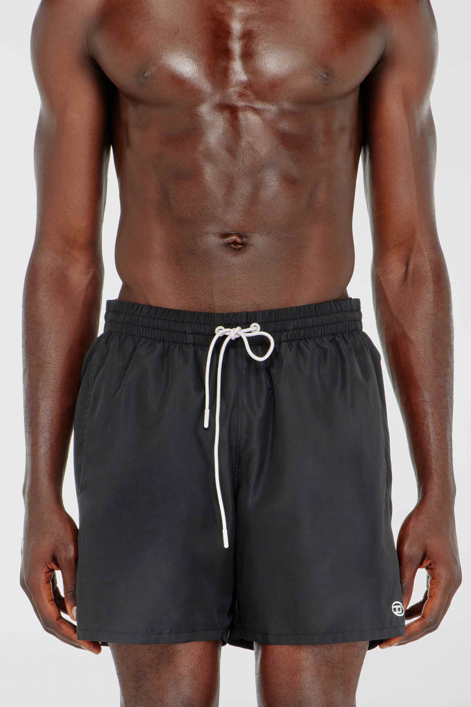 Black Swim shorts with metallic Oval D logo