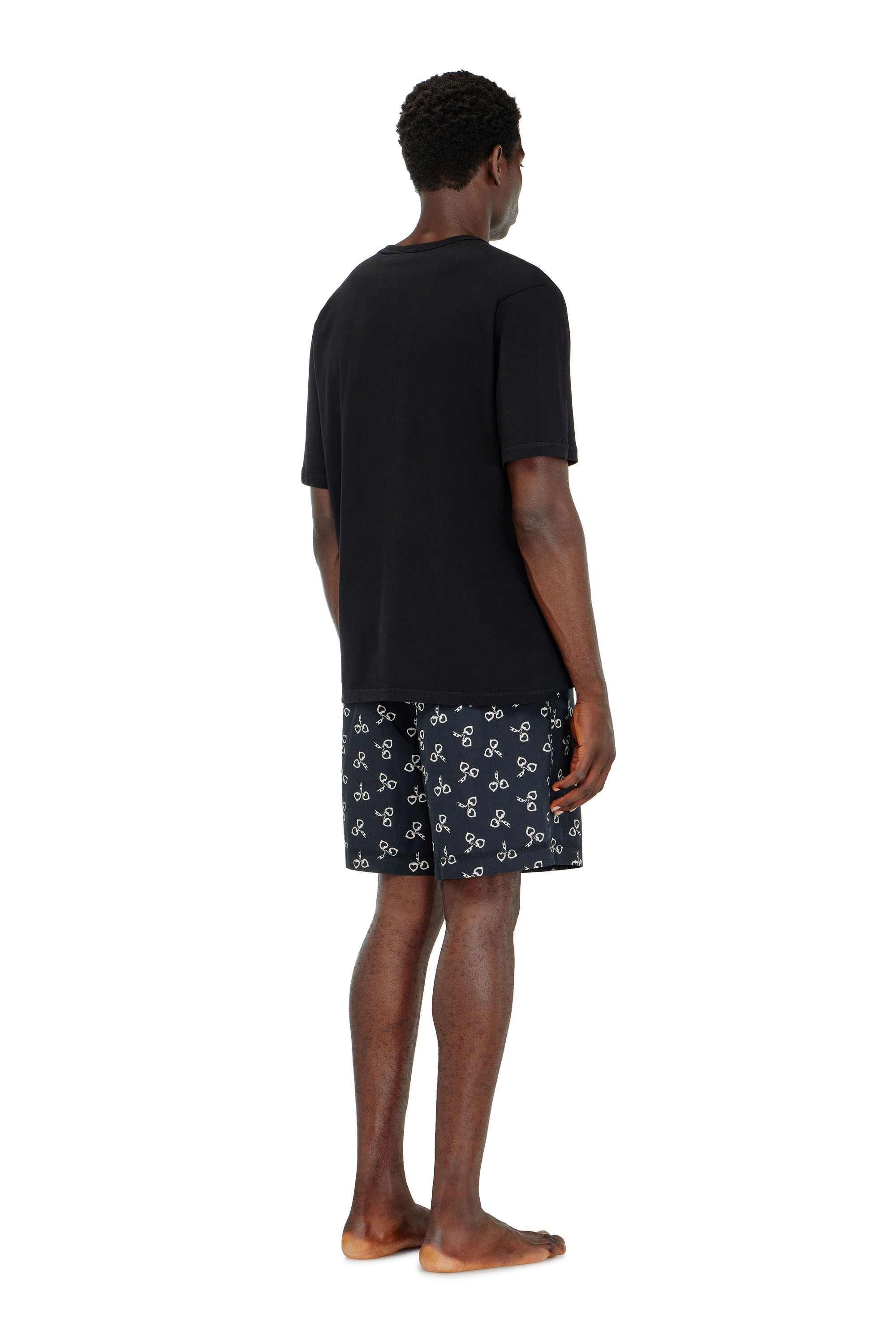 Cotton pyjama set with handcuff print