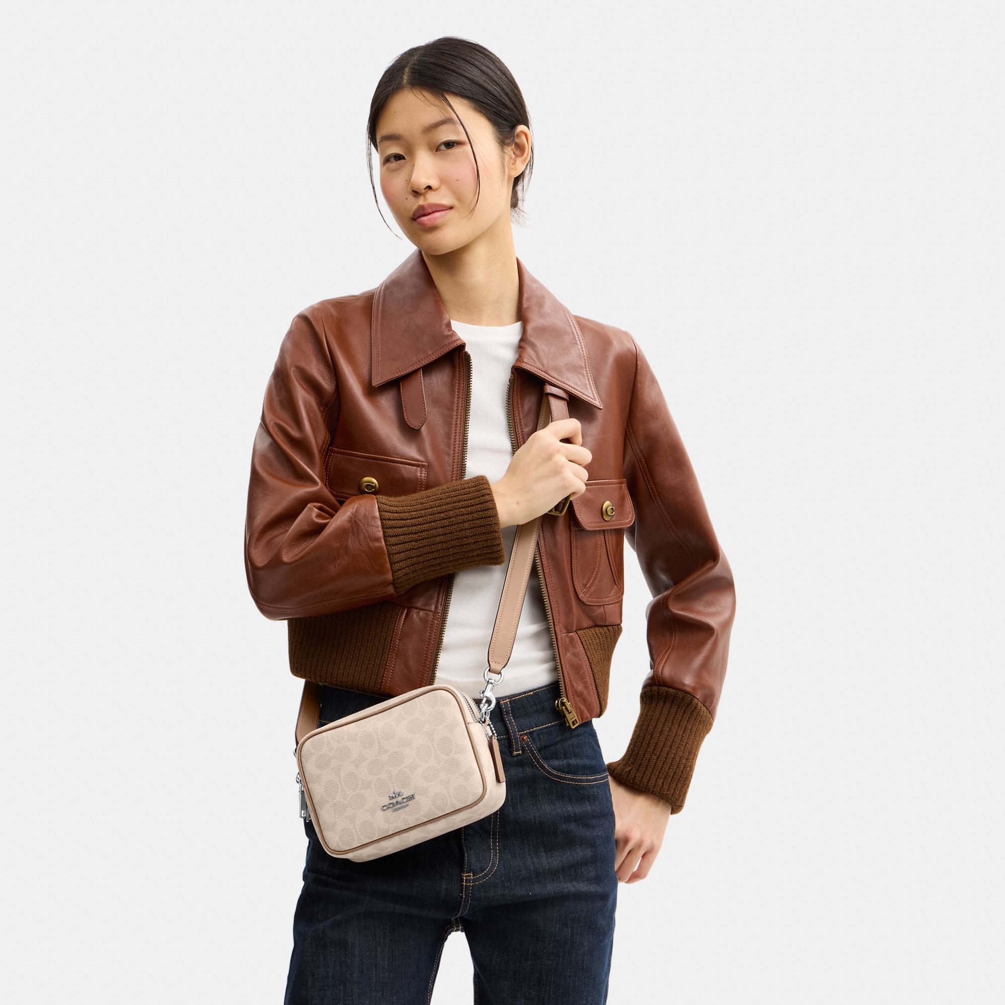 Mini Carey Crossbody Bag In Signature Canvas