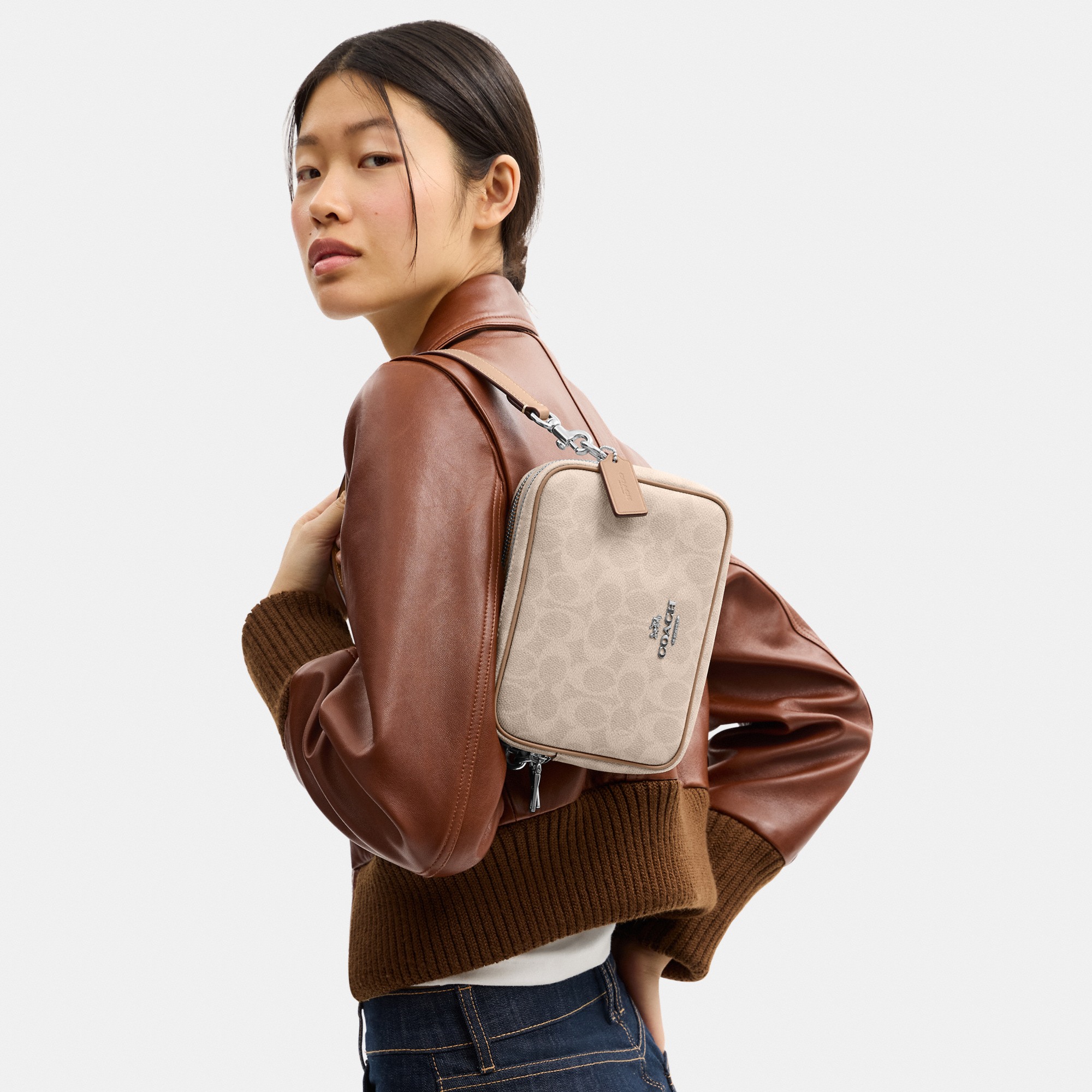 Mini Carey Crossbody Bag In Signature Canvas