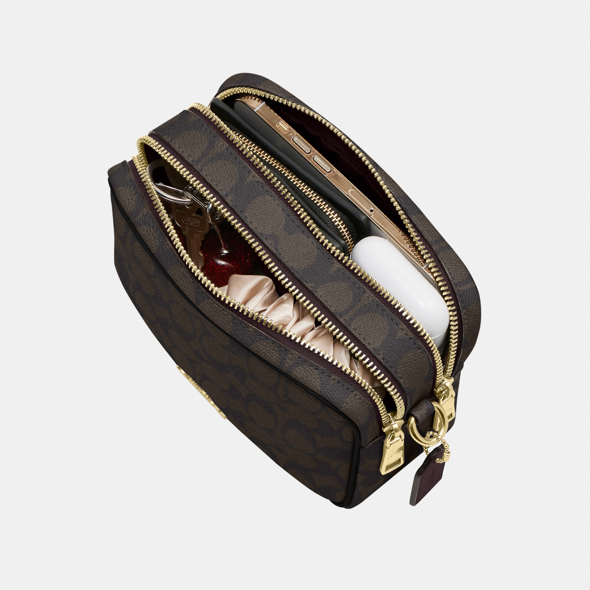 Mini Carey Crossbody Bag In Signature Canvas
