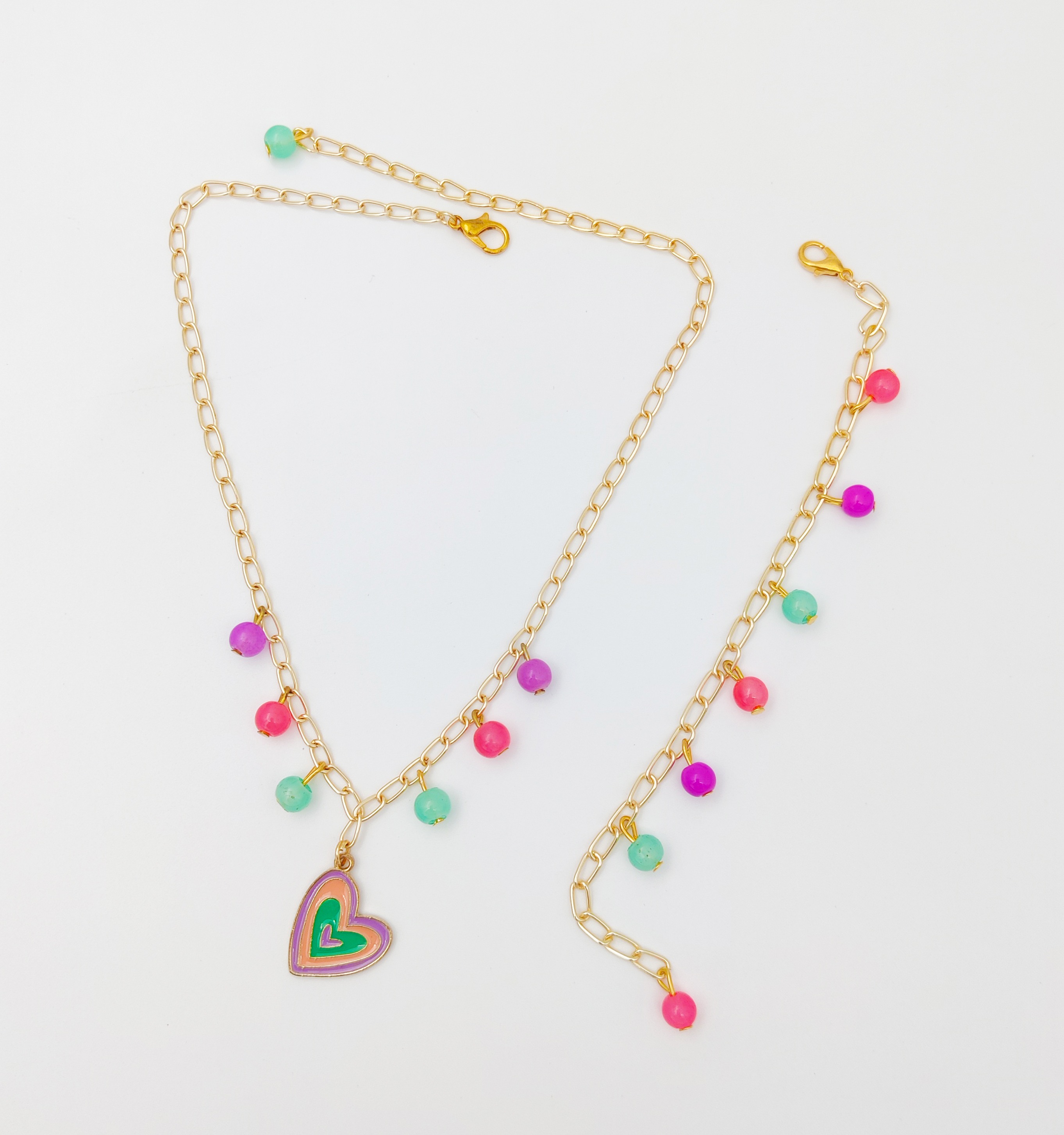 Lime By Manika | Heart Enameled Charm Necklace & Beaded Bracelet Set, pink, mauve, green undefined