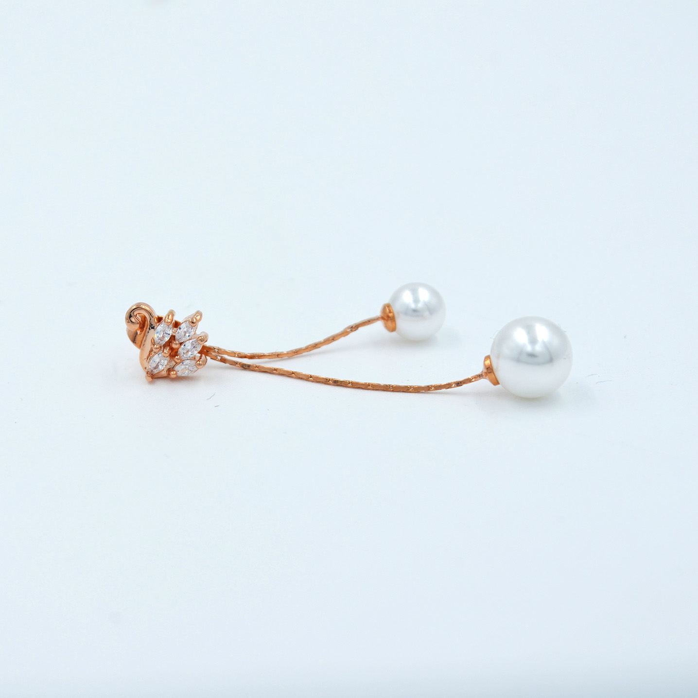 The Nila Rose Gold plated Swan Crystal Top with pearl Danglers