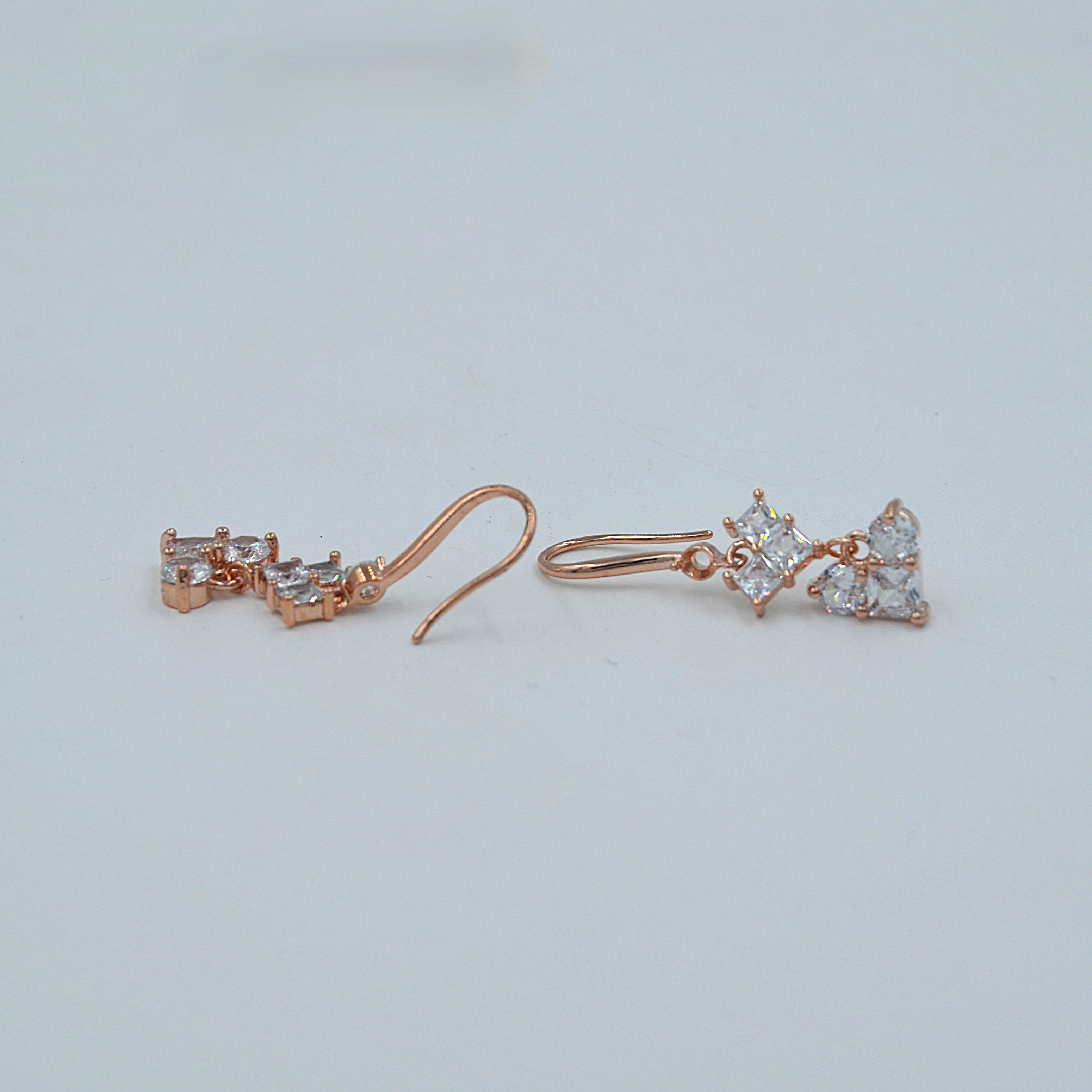 The Nila Rose Gold Plated Crystal Heart Shaped Drop Earrings