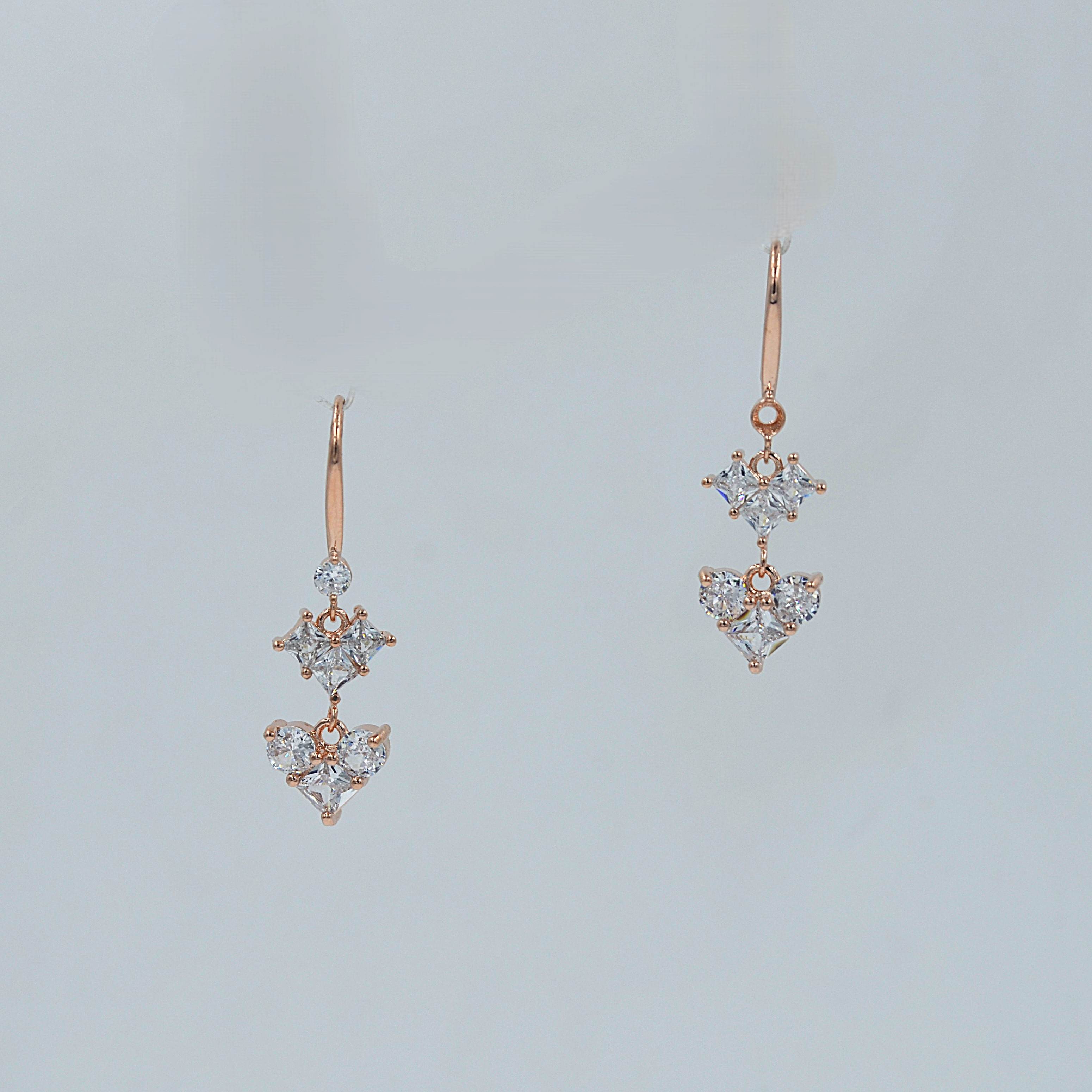 The Nila Rose Gold Plated Crystal Heart Shaped Drop Earrings