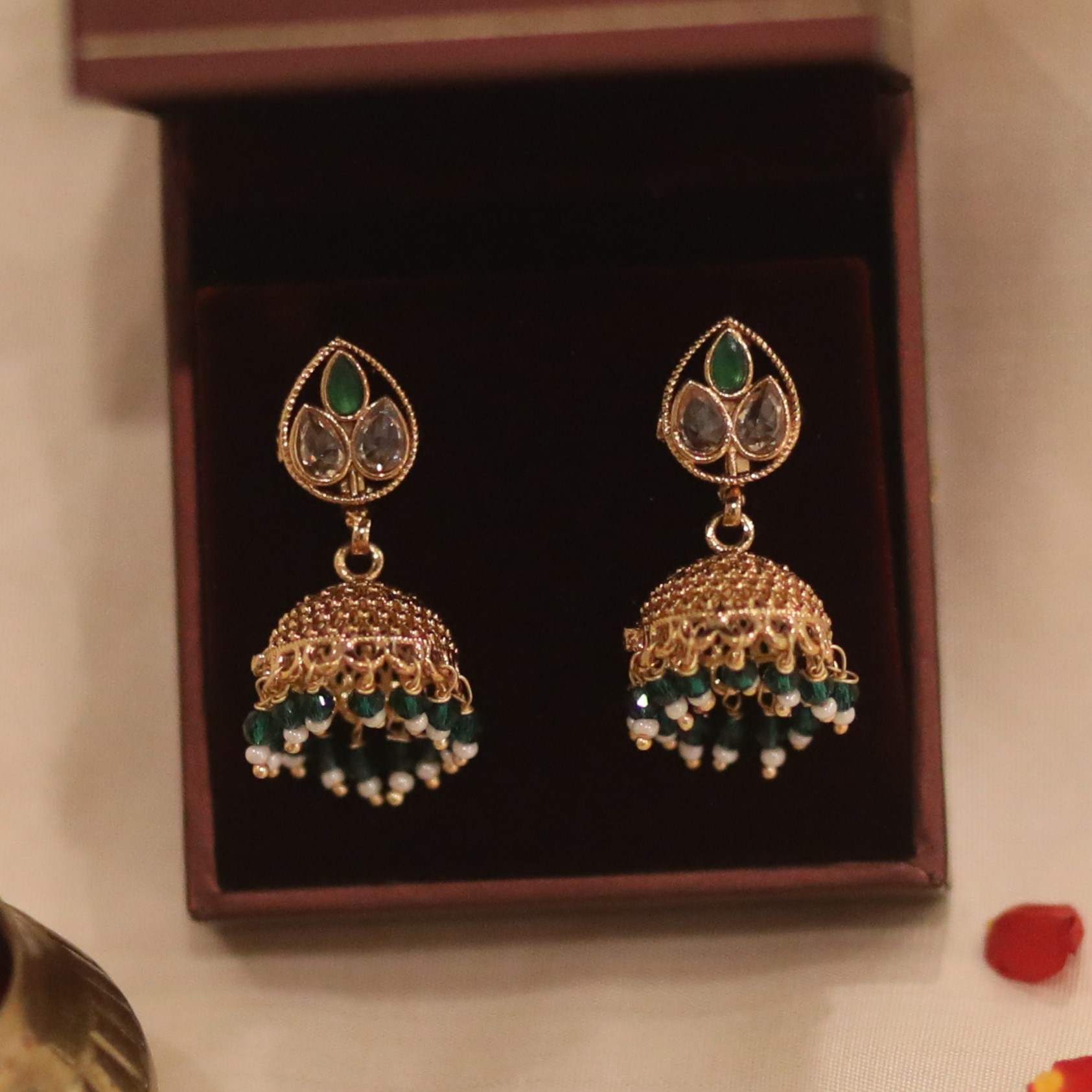 The Nila Gold Plated Emerald Ethnic Jhumkas