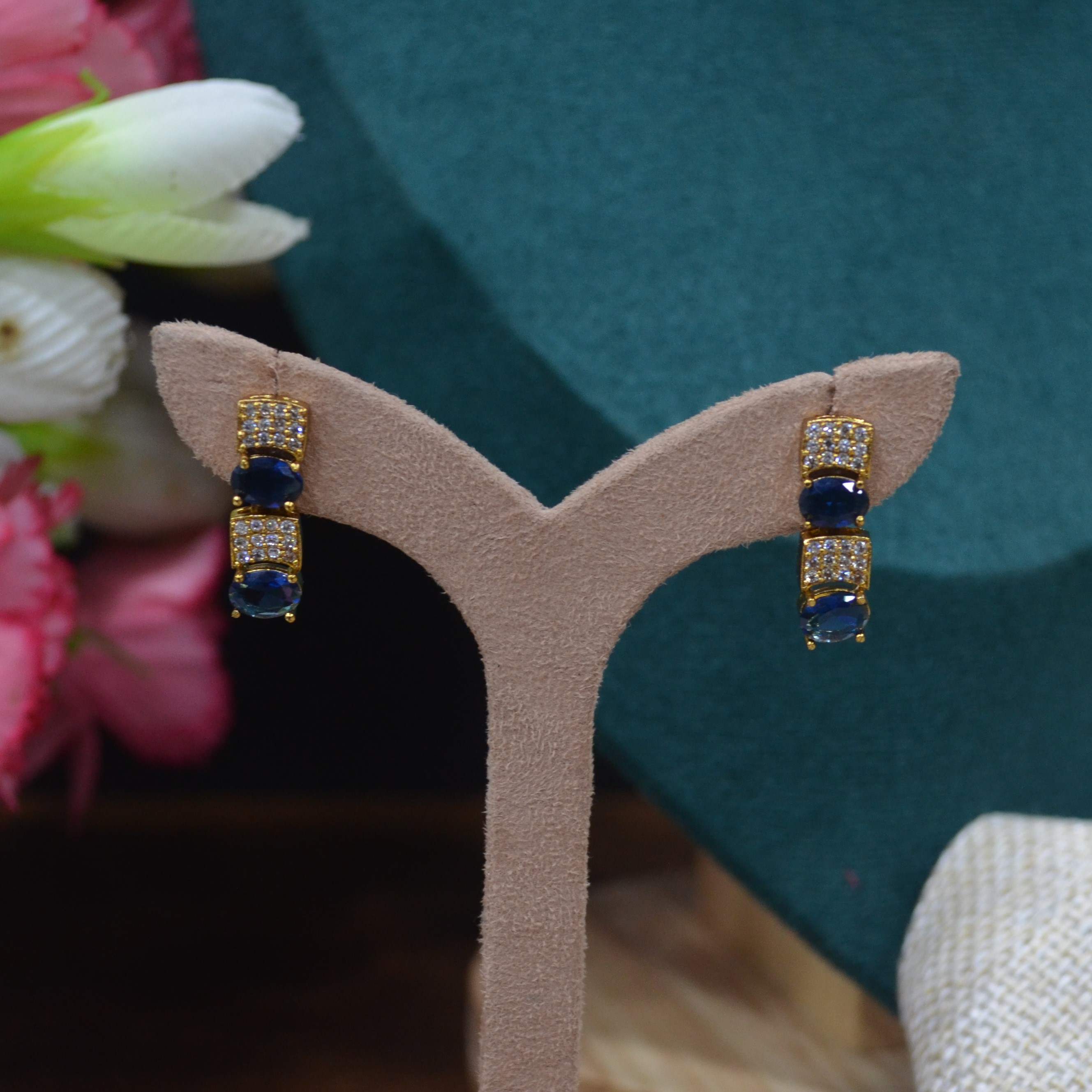 The Nila Gold Plated Crystal and Blue Sapphire Studded Choker with Drop Earnings