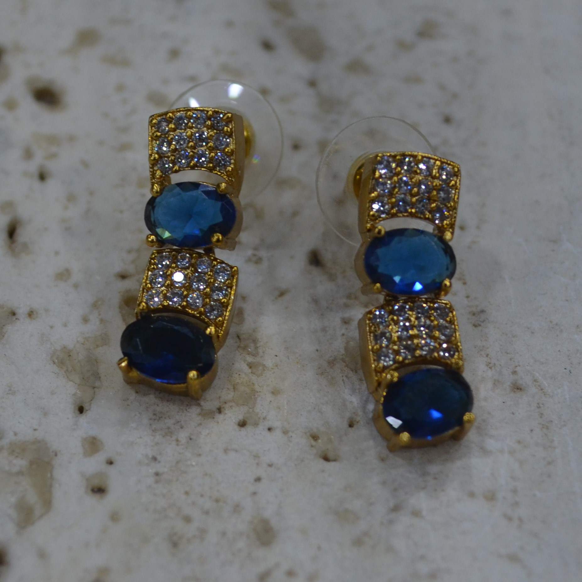 The Nila Gold Plated Crystal and Blue Sapphire Studded Choker with Drop Earnings