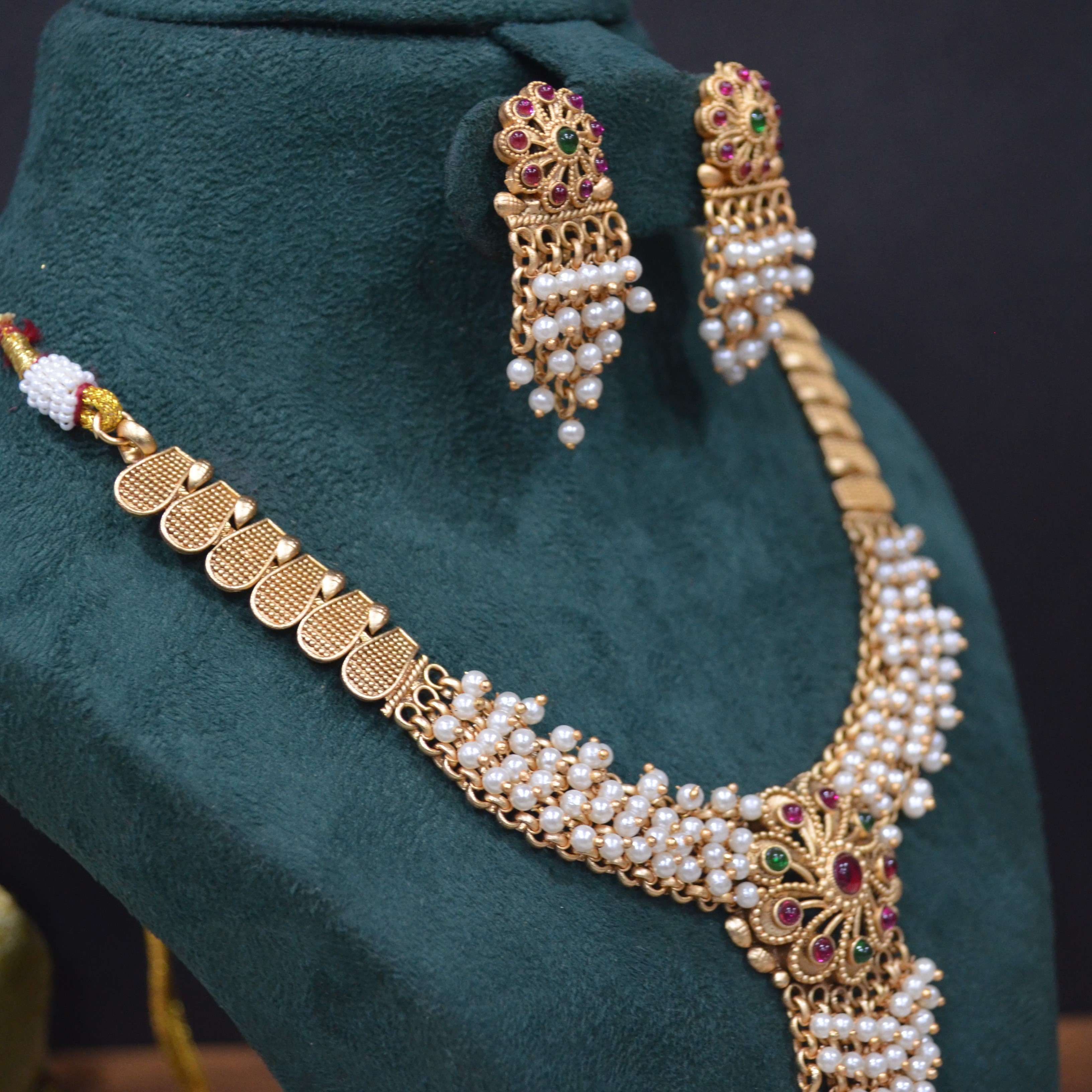 The Nila Gold Plated Pearl Necklace with Danglers