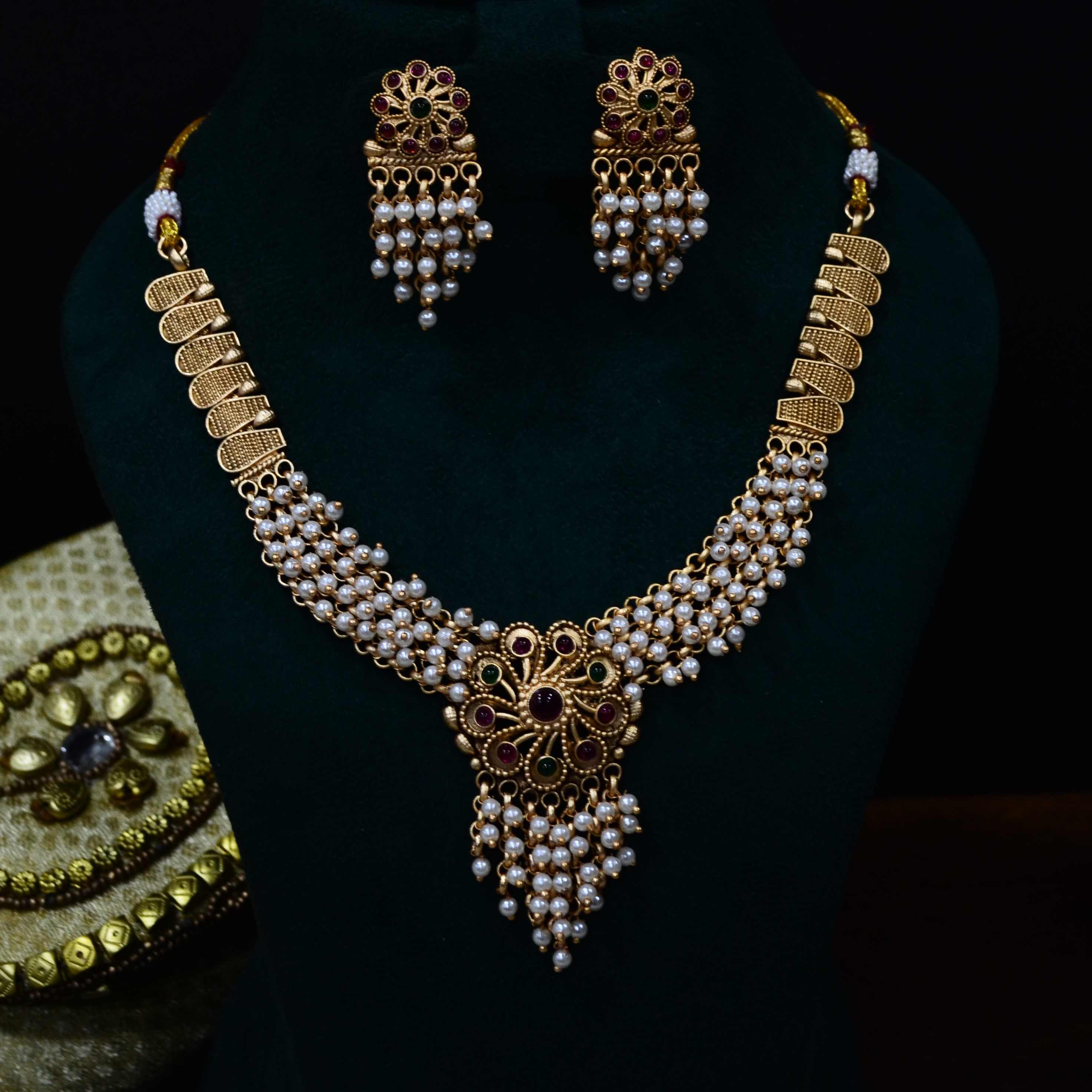 The Nila Gold Plated Pearl Necklace with Danglers