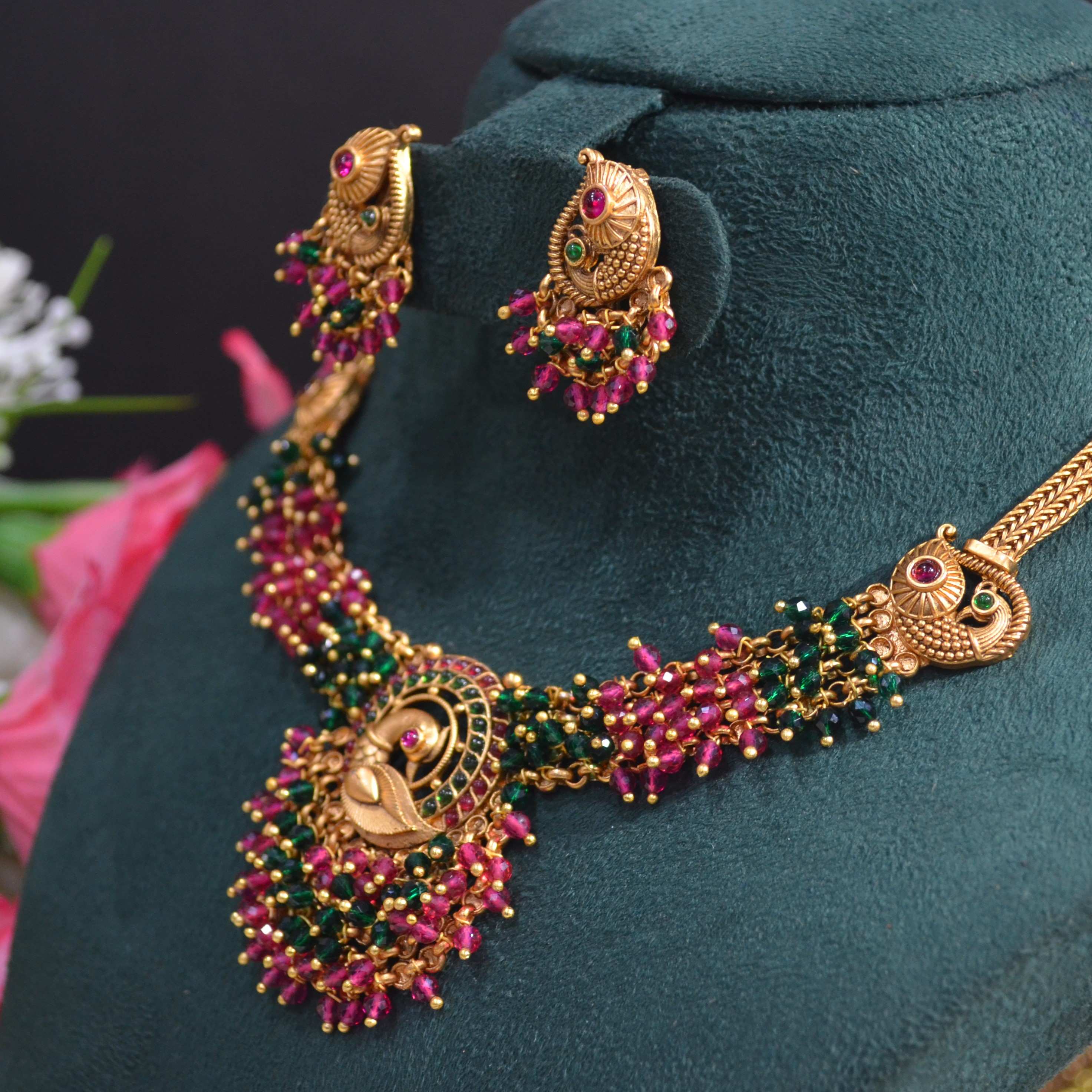 The Nila Gold Plated Peacock Design Kundan Choker Set