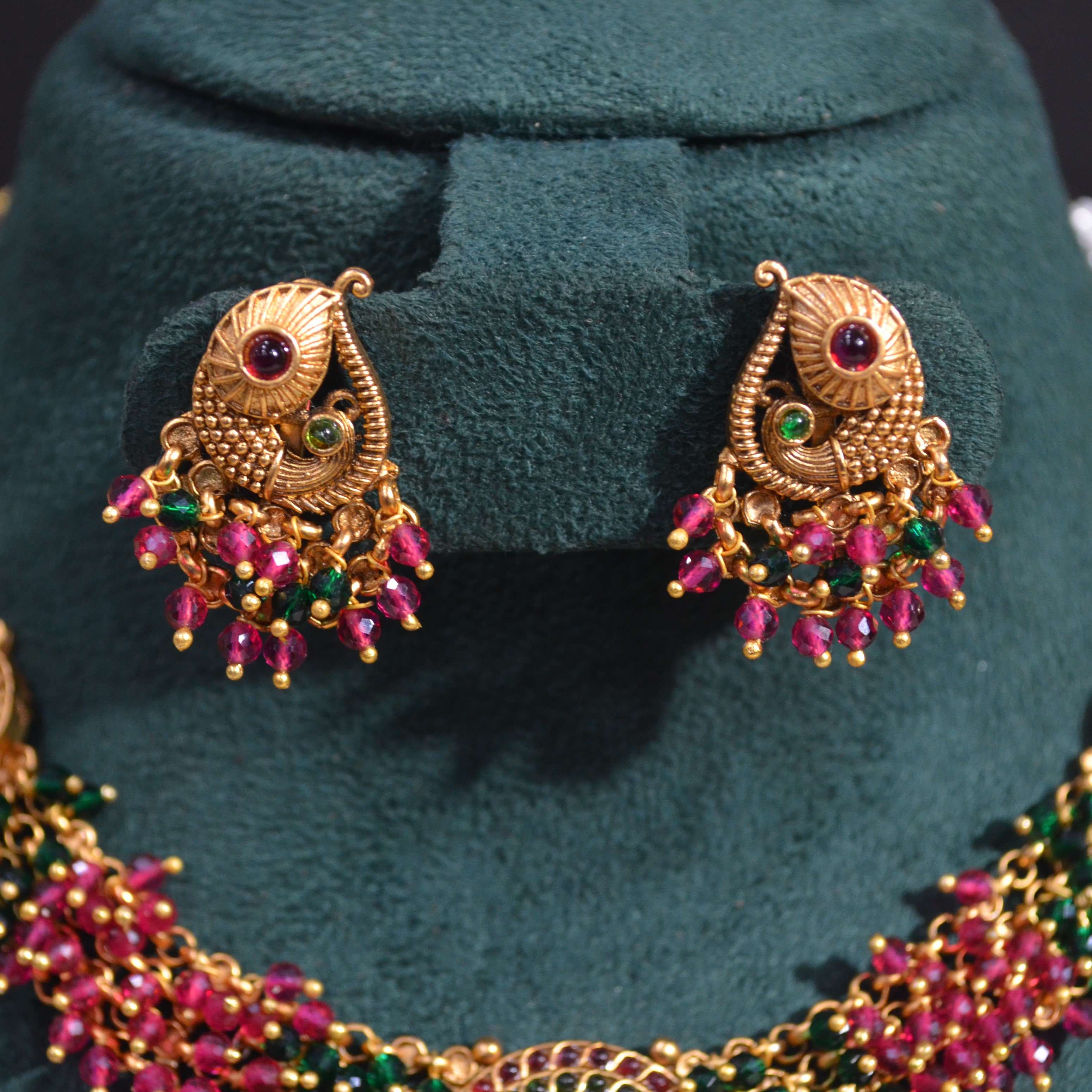 The Nila Gold Plated Peacock Design Kundan Choker Set