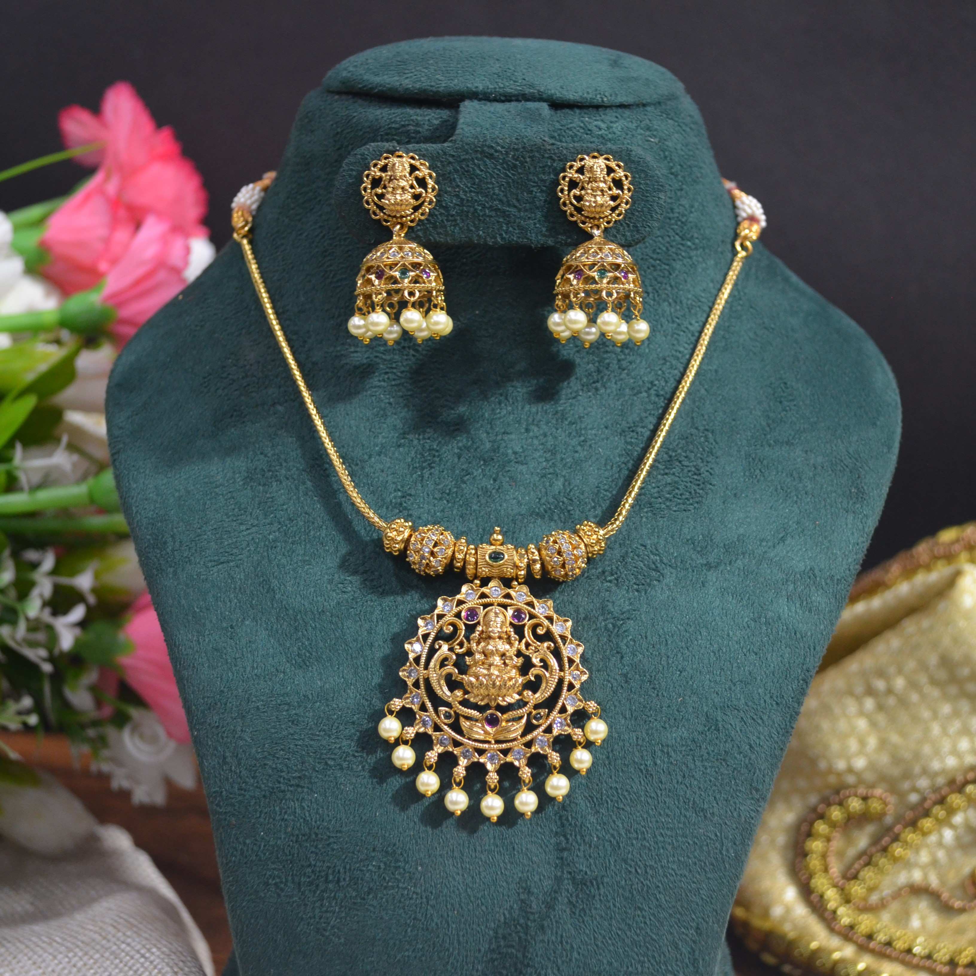 The Nila Gold Plated Temple Design Pendant Chain with Pearl Jhumkas