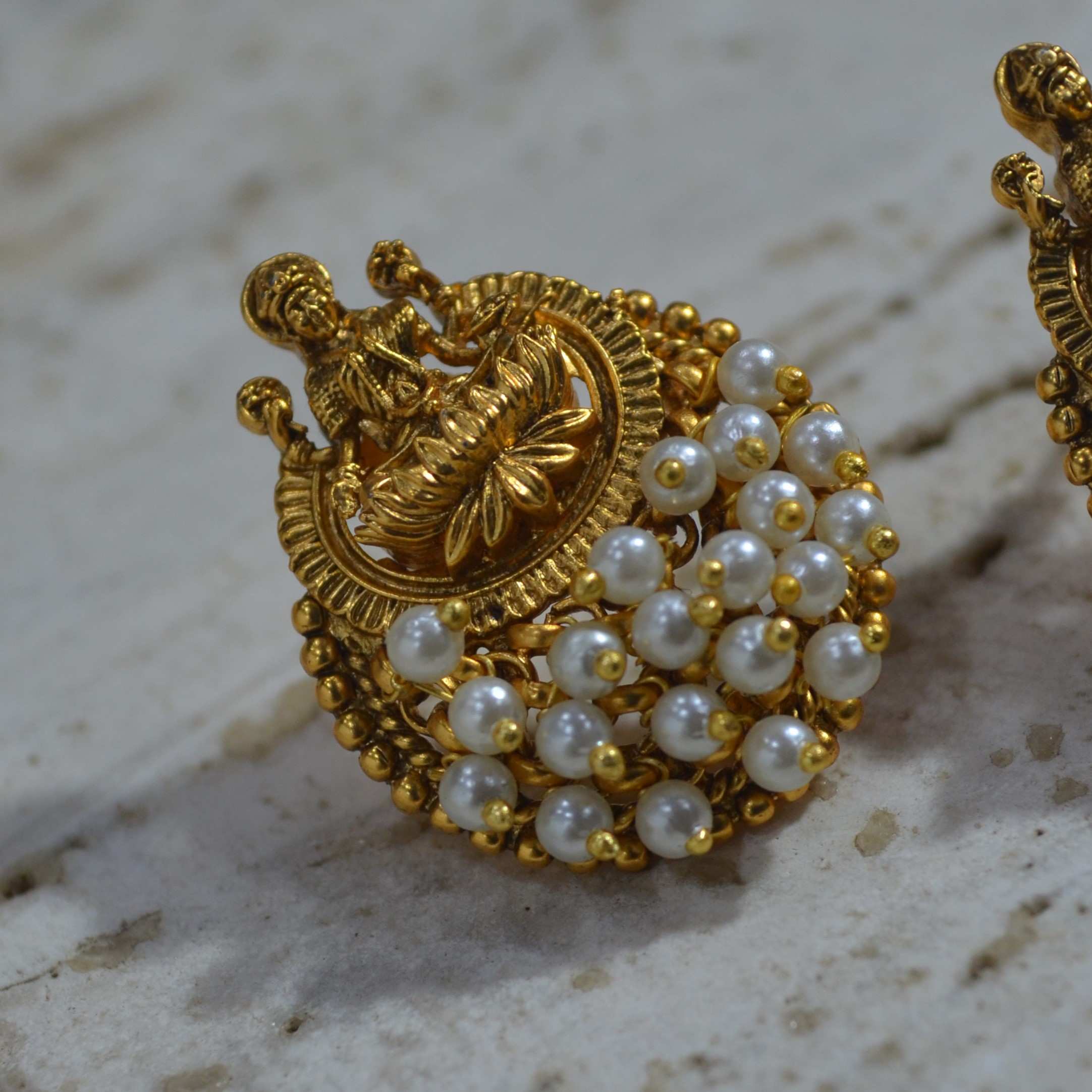 The Nila Gold Plated Temple Design Pendant Chain with Pearl Tops Earrings