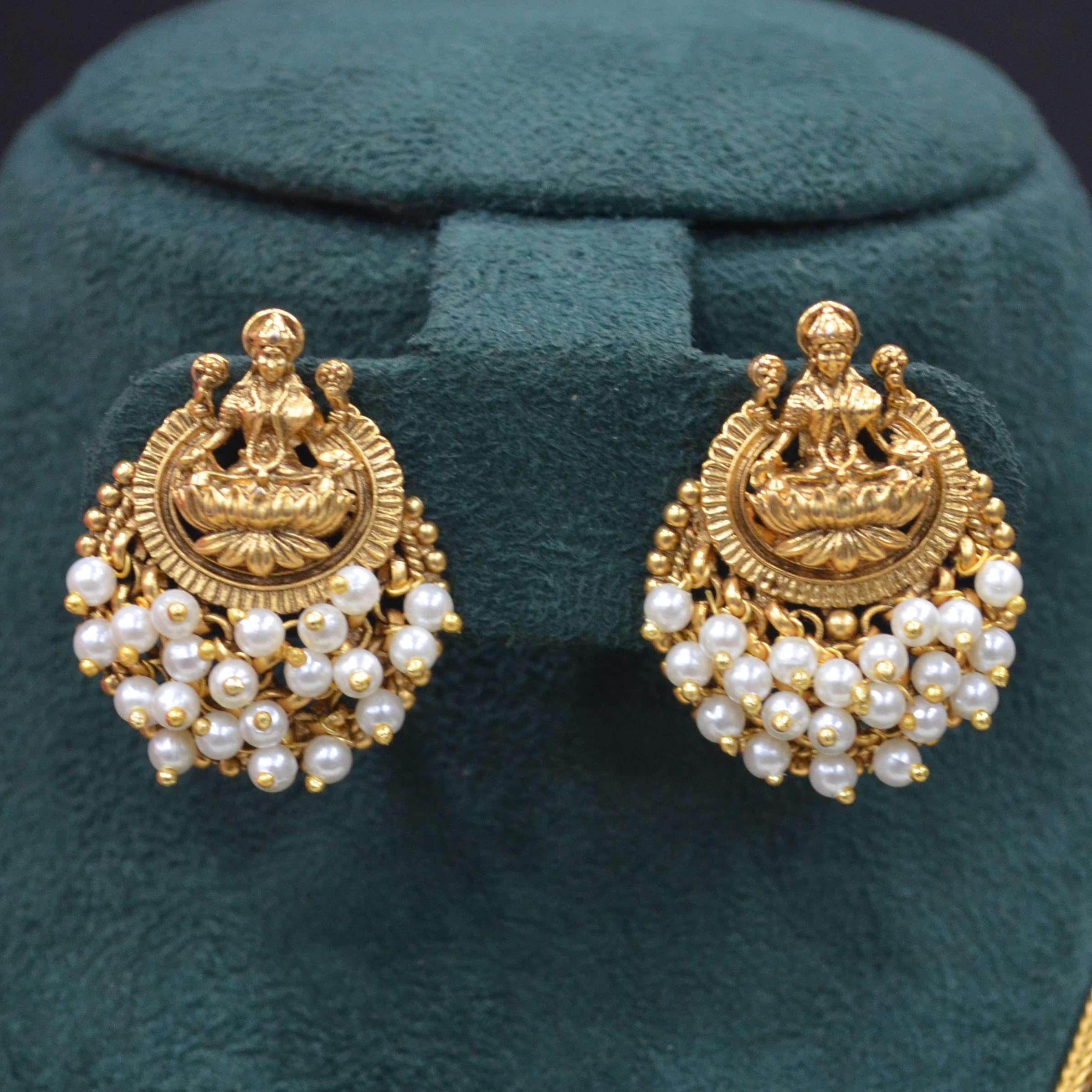 The Nila Gold Plated Temple Design Pendant Chain with Pearl Tops Earrings
