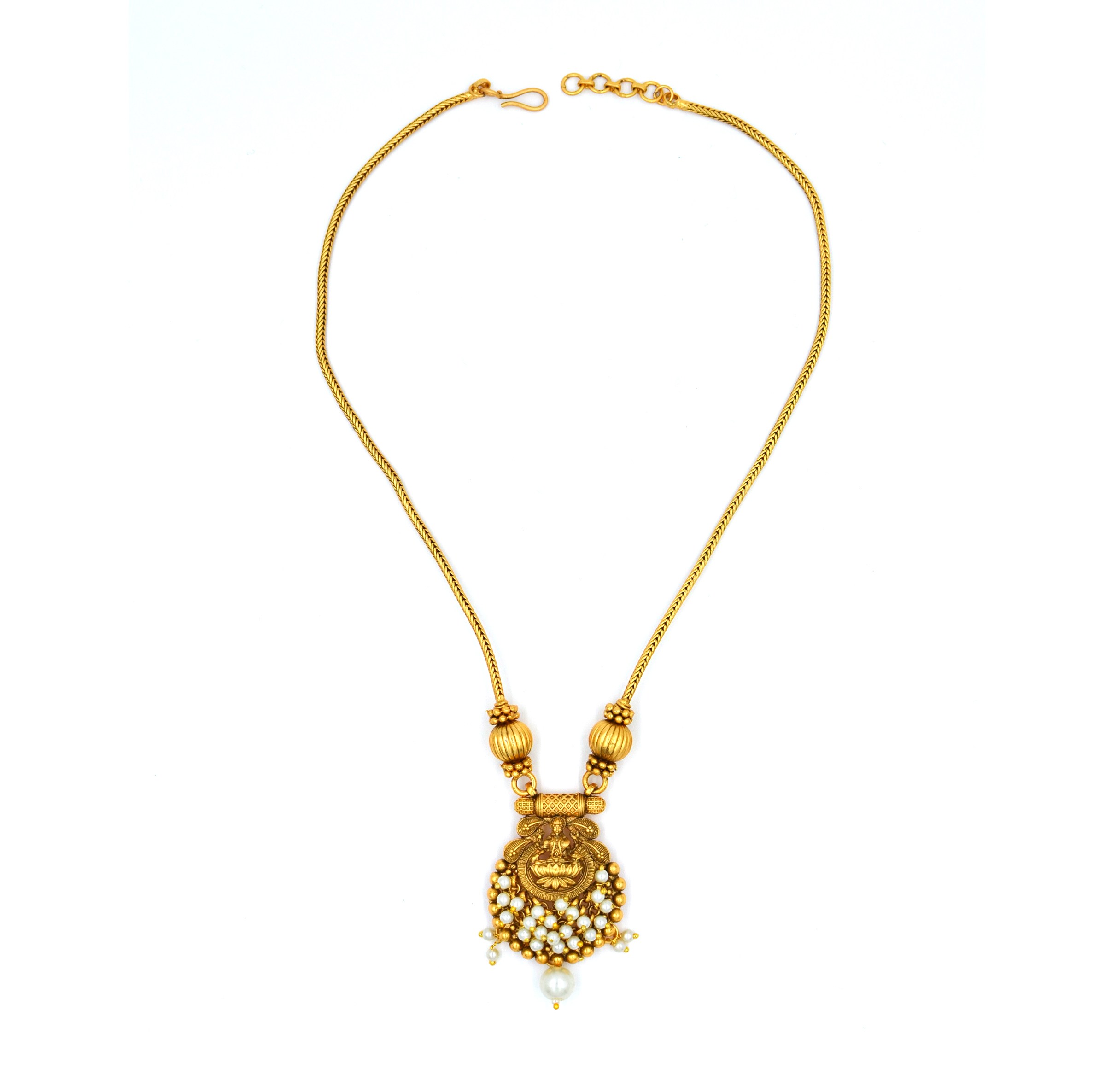 The Nila Gold Plated Temple Design Pendant Chain with Pearl Tops Earrings