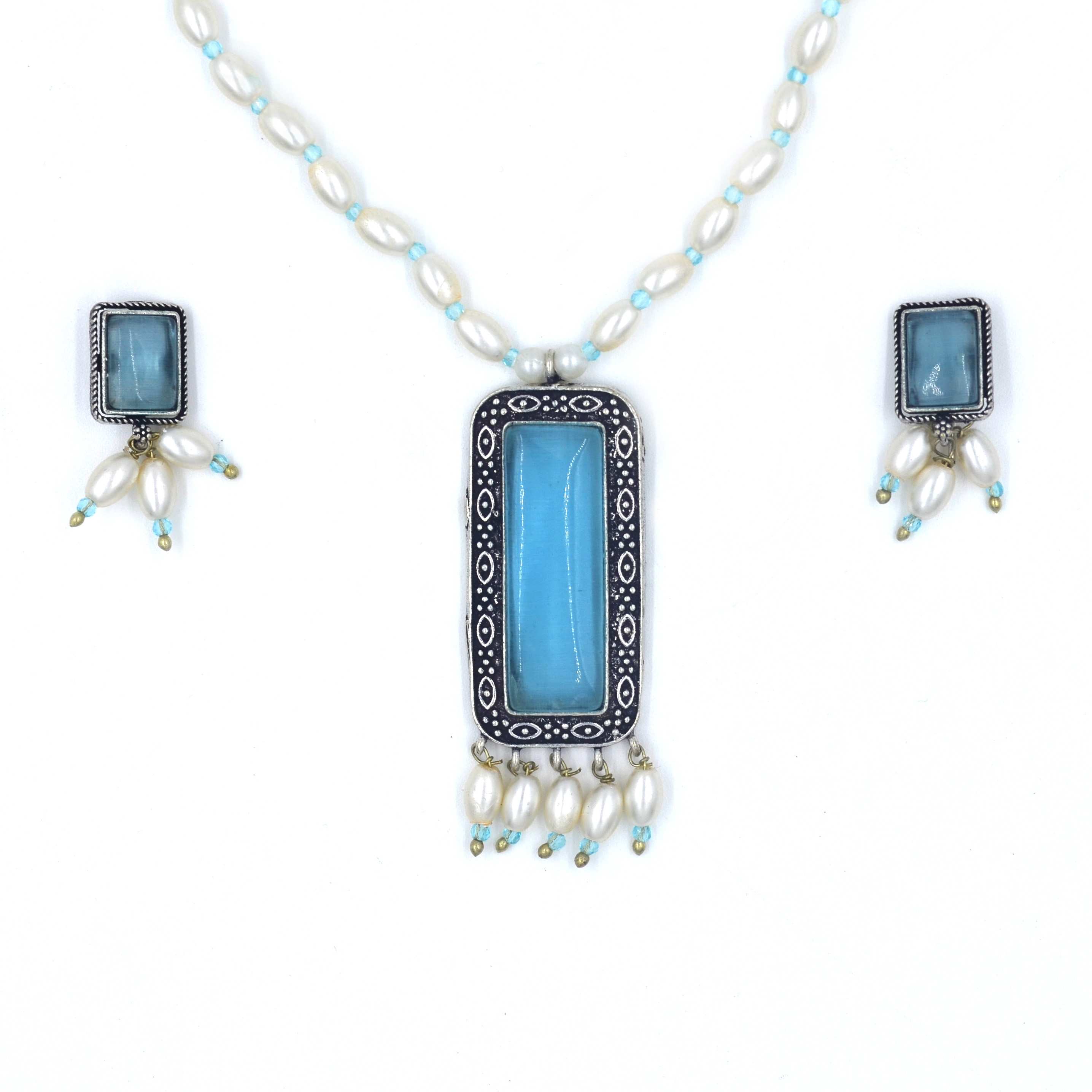 The Nila Silver Oxidized Torquoise Pendant with Pearl chain and Top Earrings