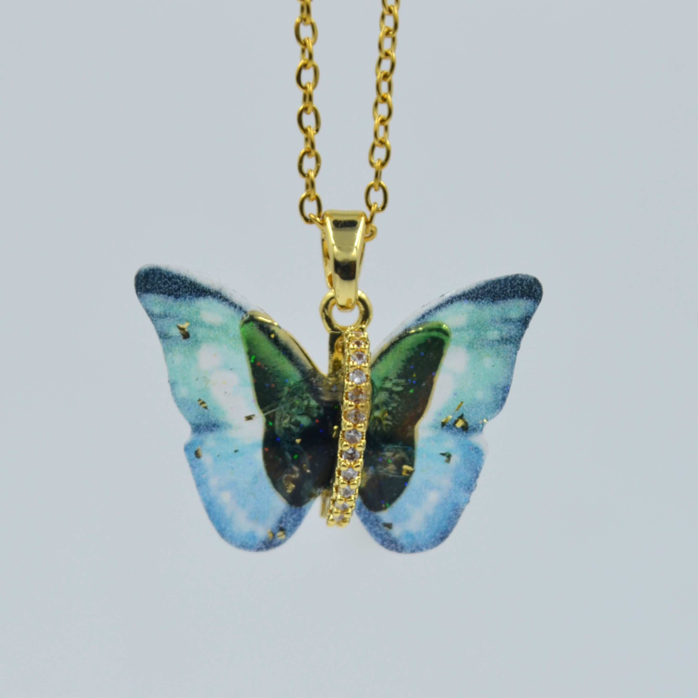 The Nila Gold Plated Epoxy Art Butterfly Design Pendant With Chain