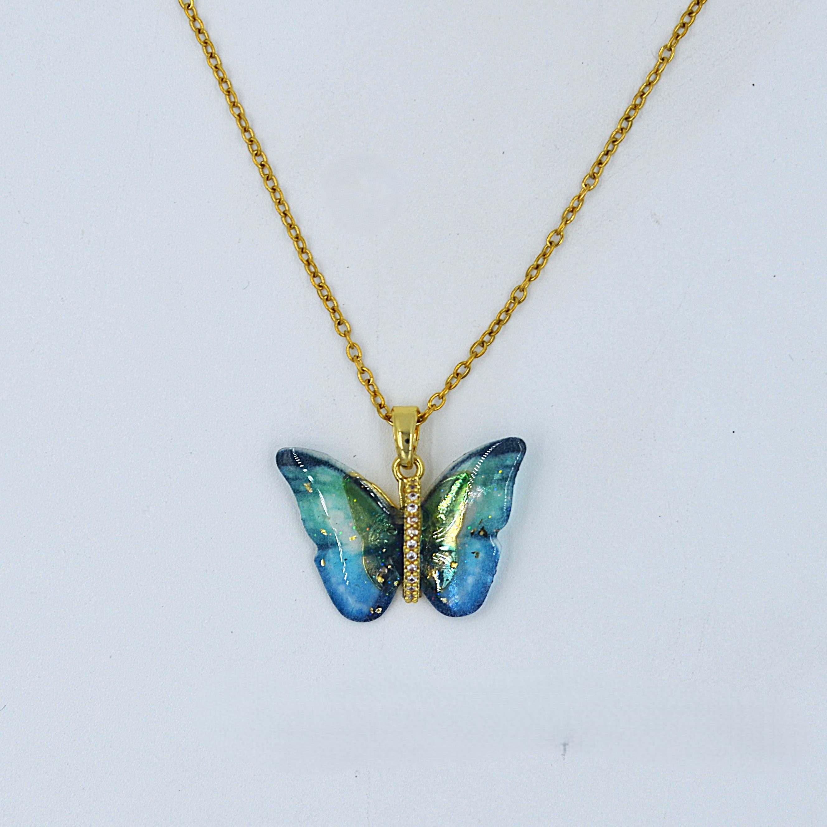 The Nila Gold Plated Epoxy Art Butterfly Design Pendant With Chain