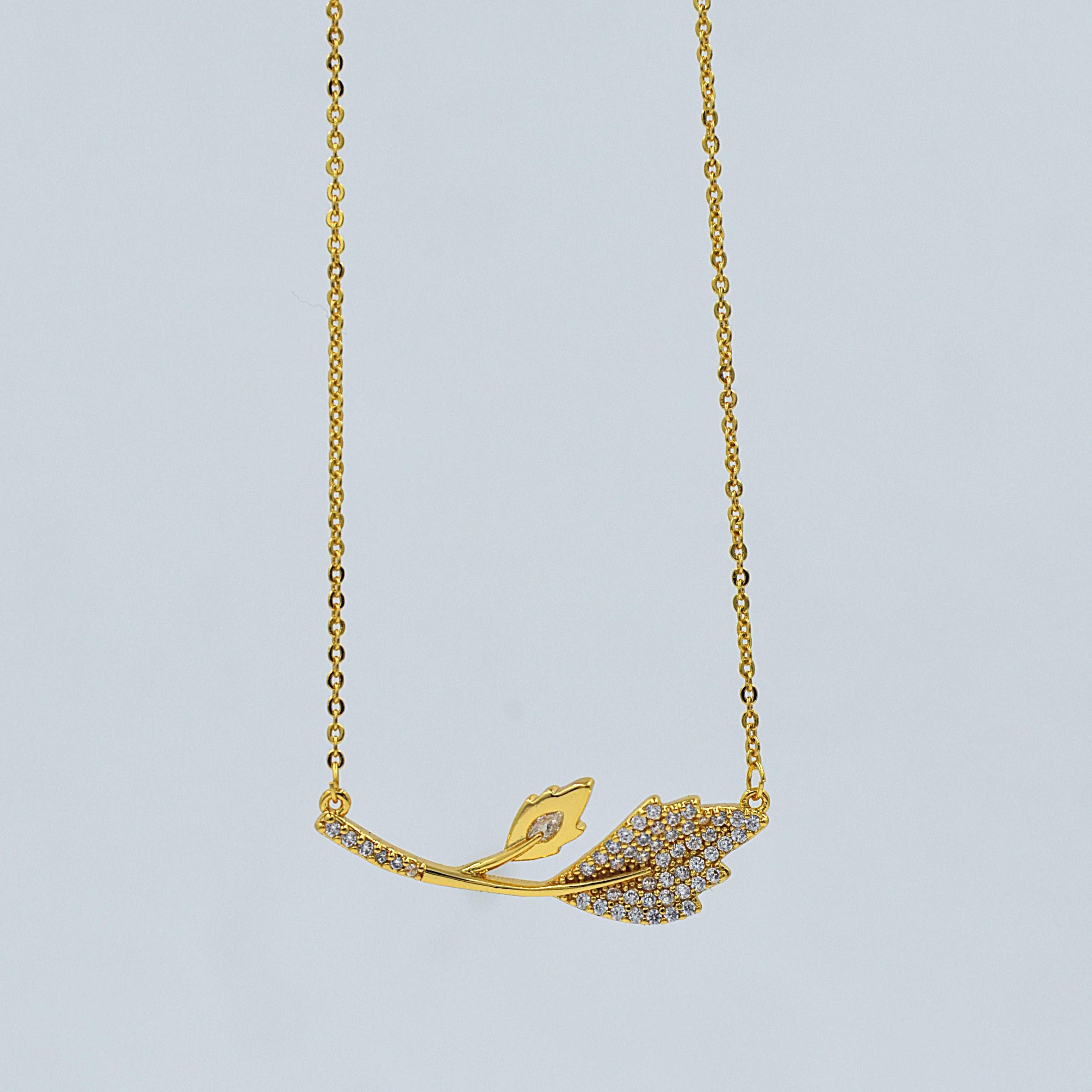 The Nila Gold Plated Leaf Design Stone Studded Chain