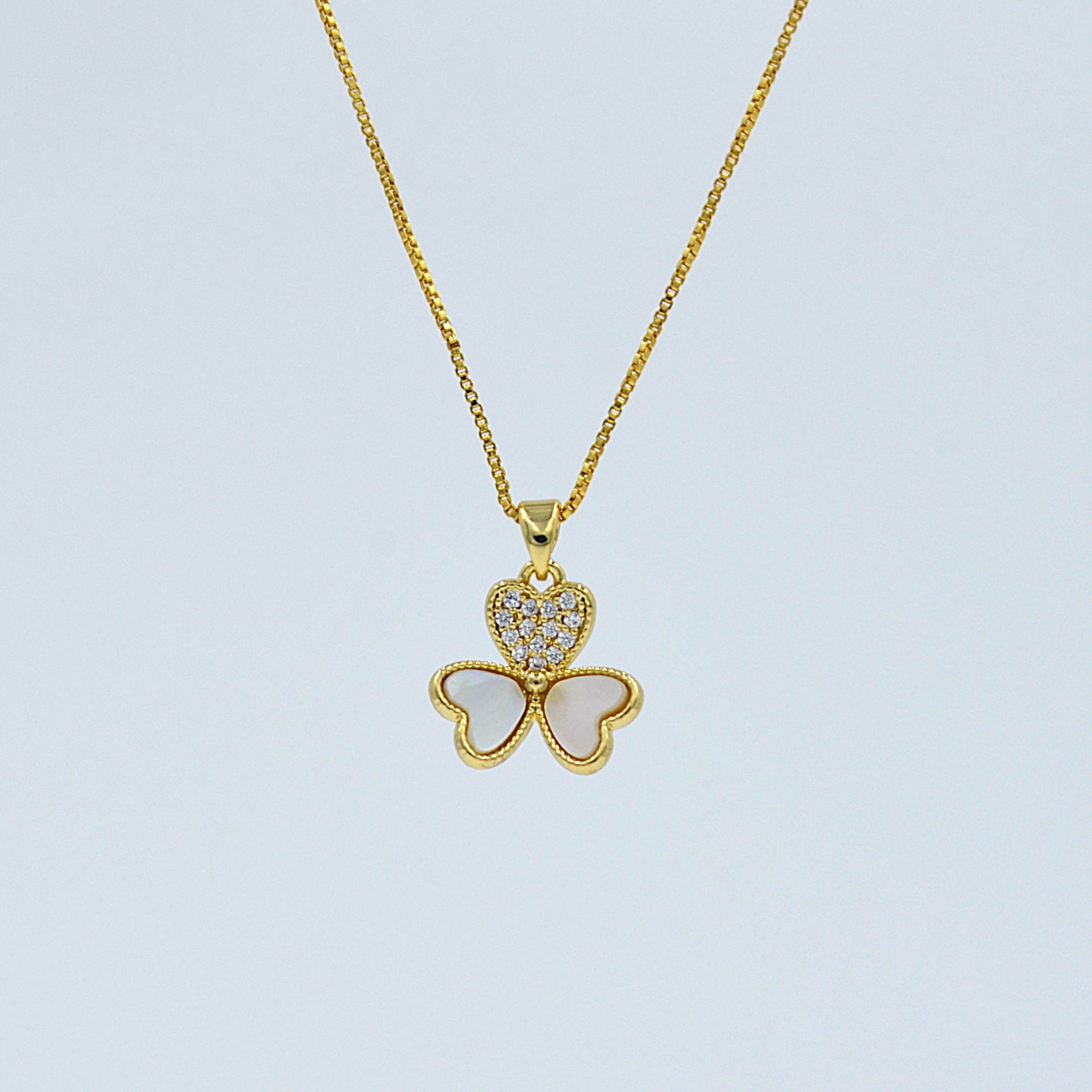 The Nila Gold plated Floral pendant chain with Stud earrings