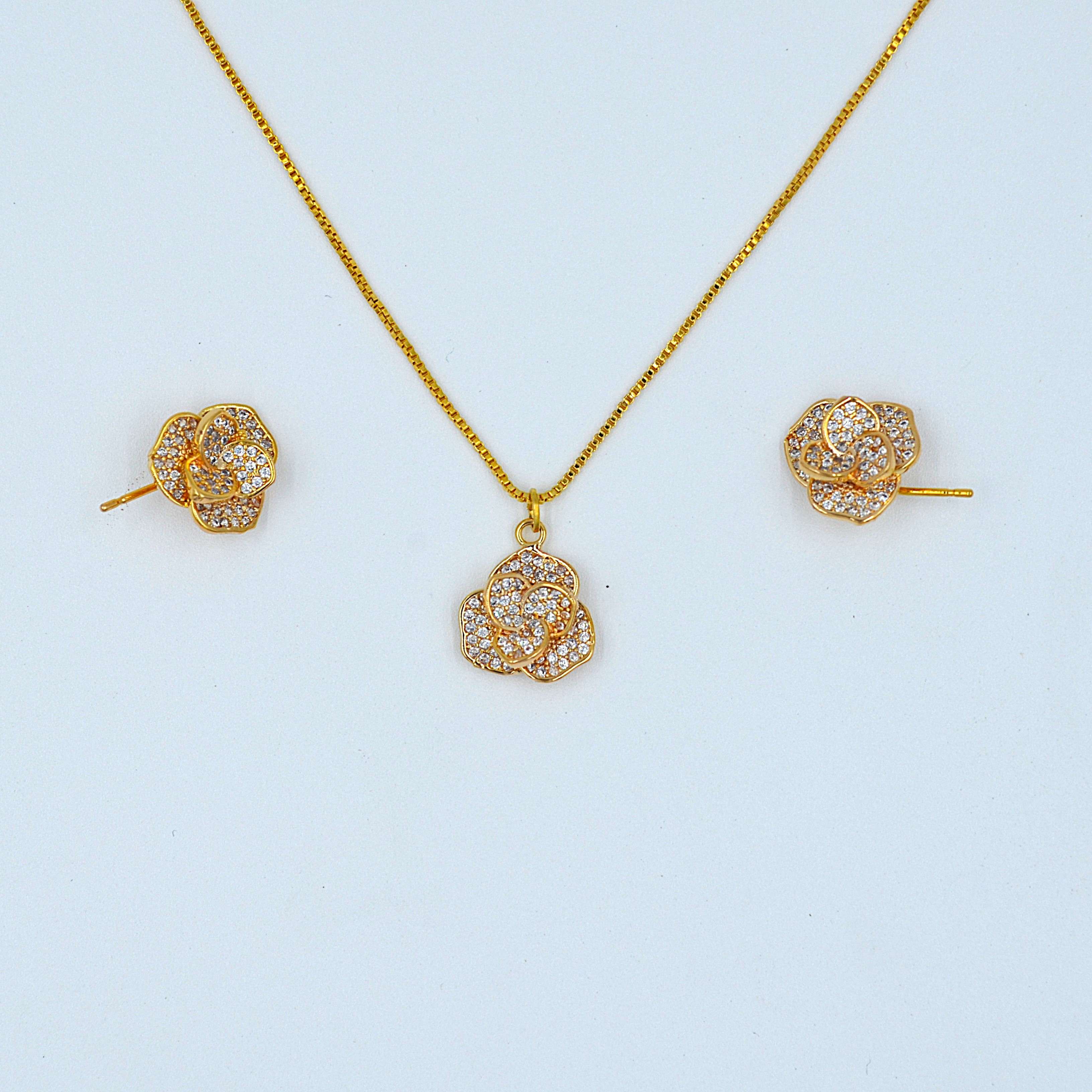 The Nila Gold plated Floral pendant chain with Stud earrings