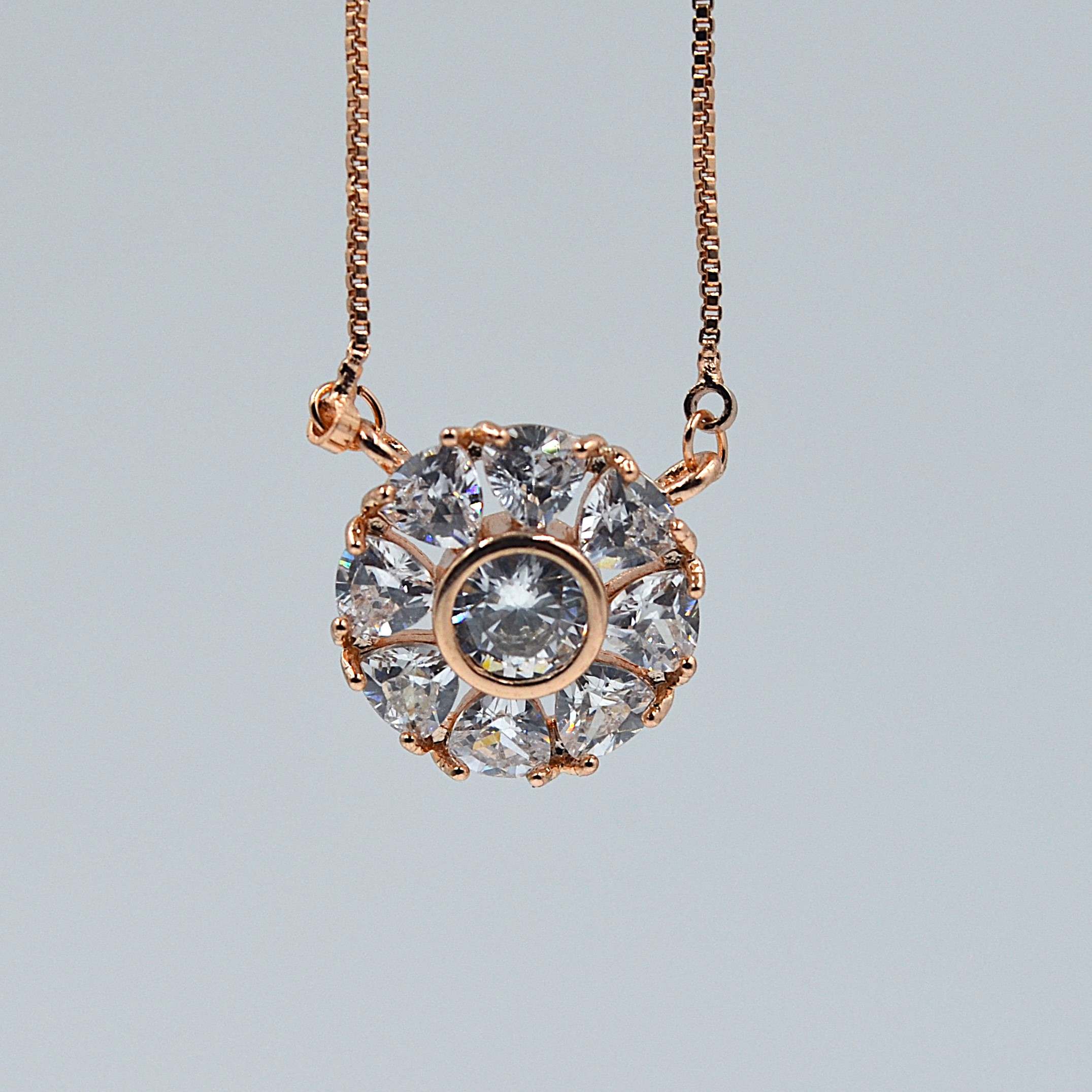 The Nila Rose Gold plated Floral pendant chain with stud earrings