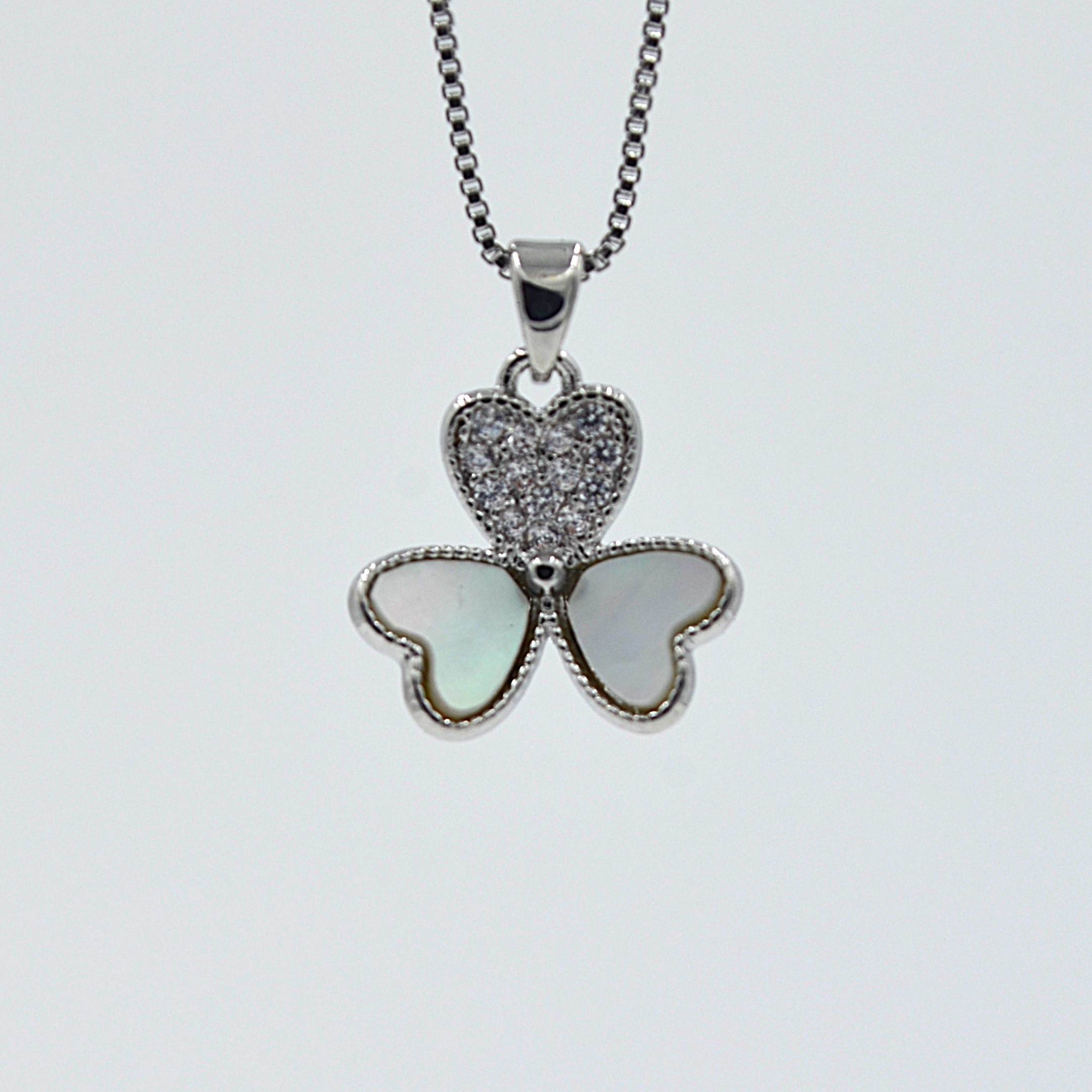 The Nila Silver plated Floral pendant chain with Stud earrings