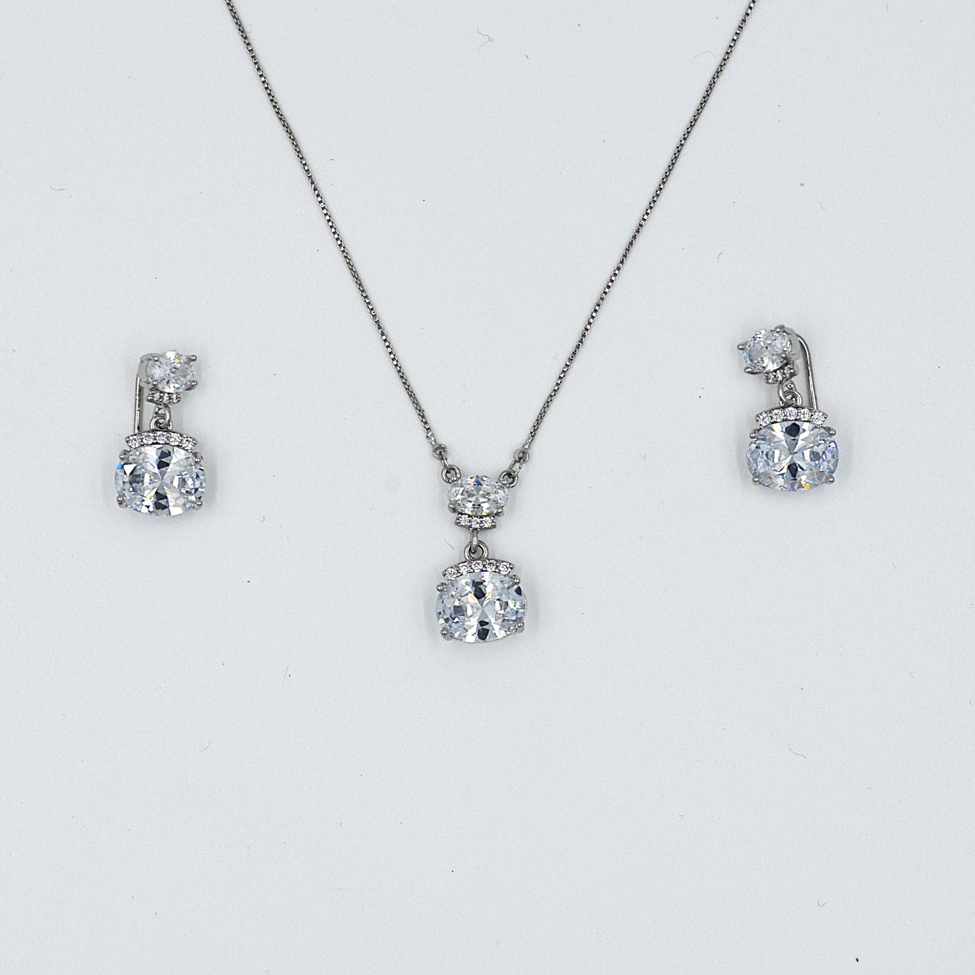 The Nila Silver Plated Solitaire Oval Pendant chain with Earrings