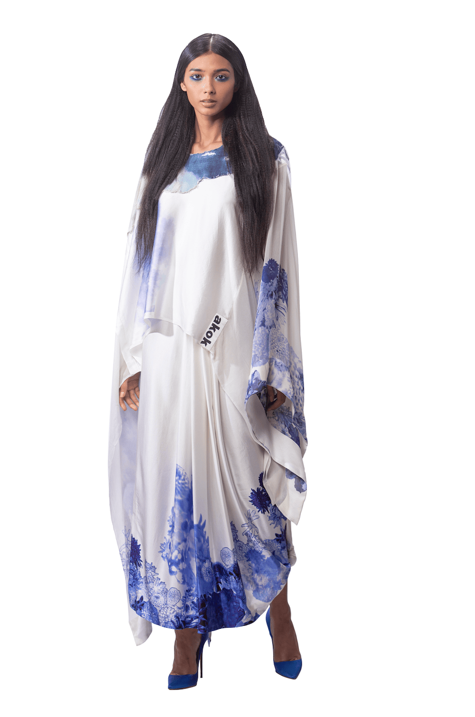 OVERSIZED CAPE WITH DRAPED SKIRT