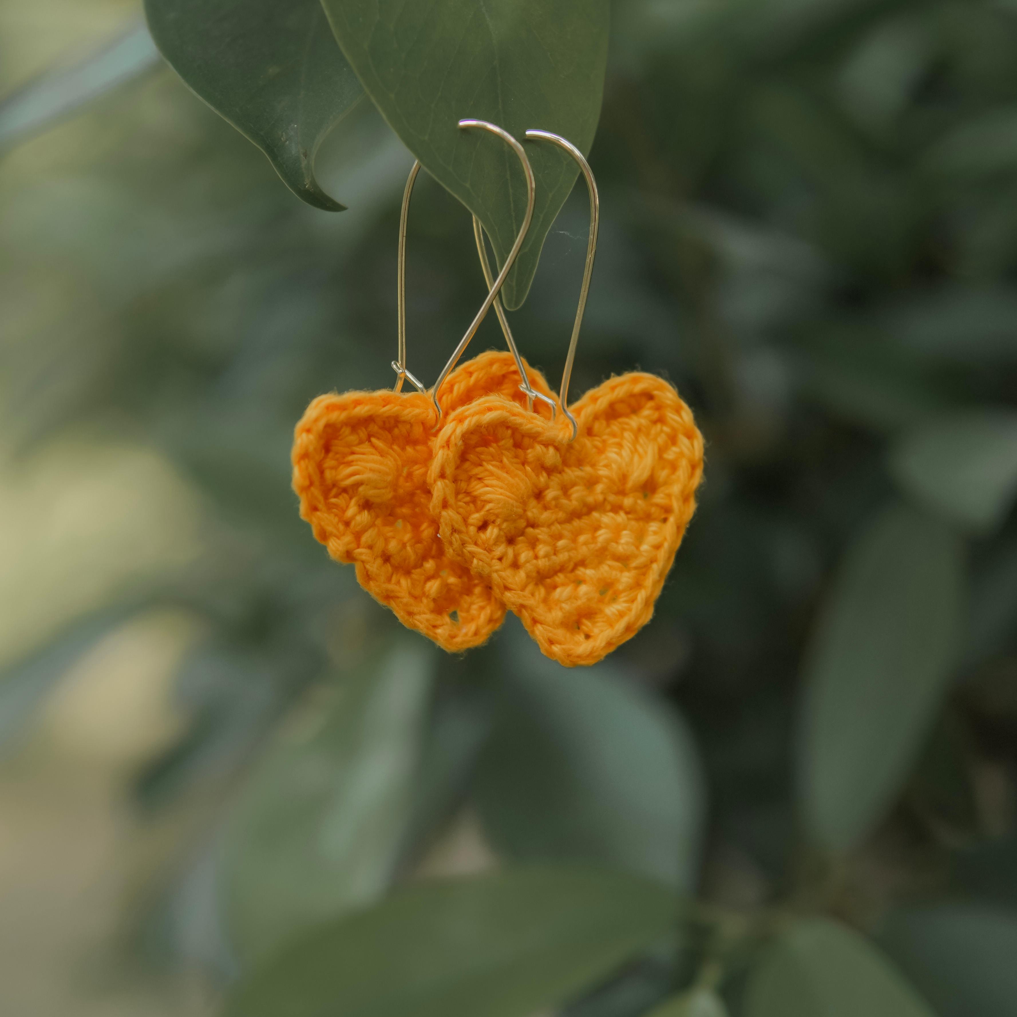 Sunshine yellow crochet heart earrings. Handmade and adorable!