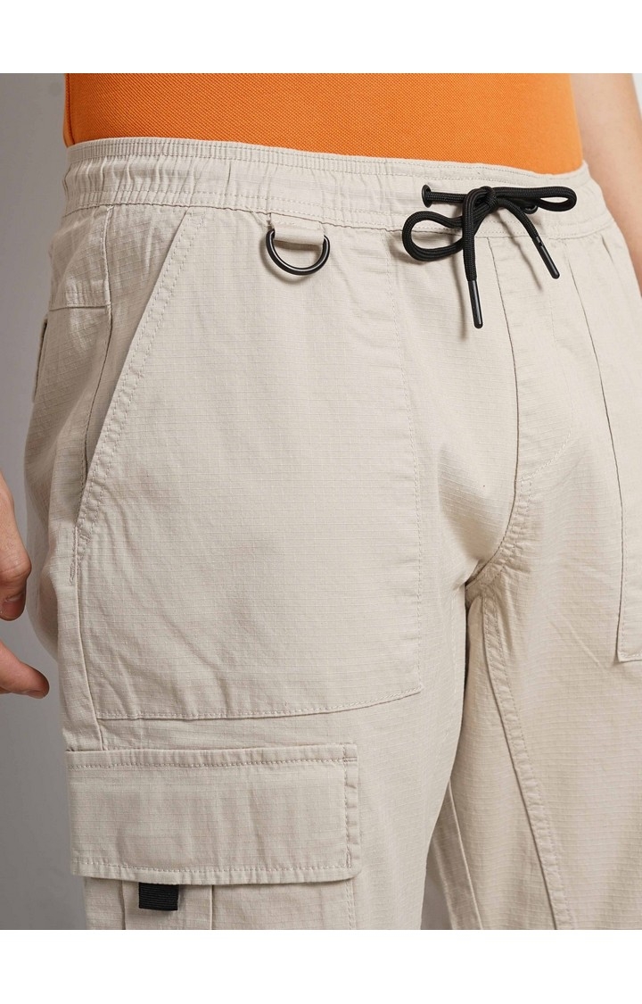 Celio Men Beige Solid Loose Fit Cotton Elastane Cargos Casual Trousers