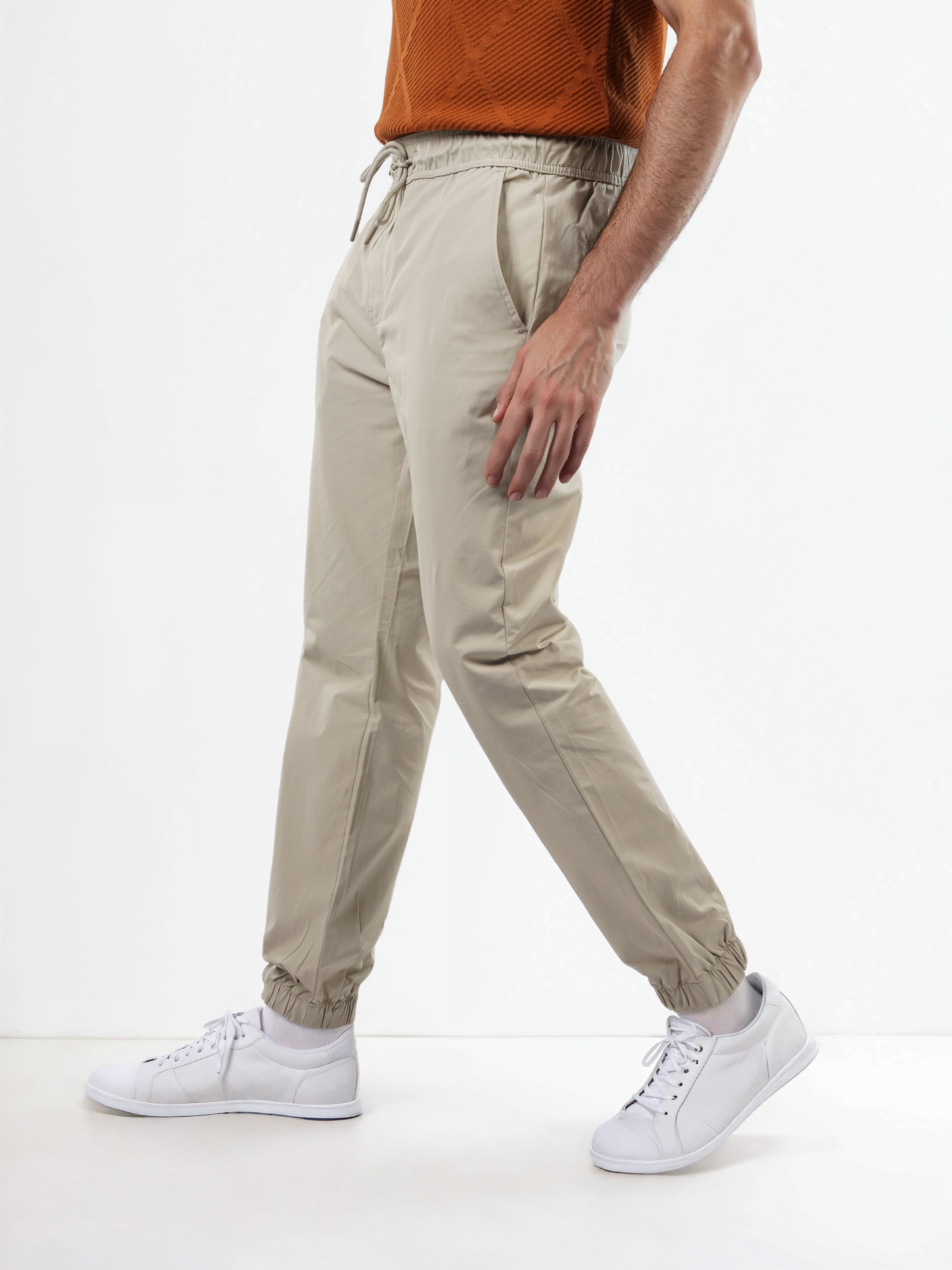 Celio Men Beige Solid Regular Fit Cotton Trousers