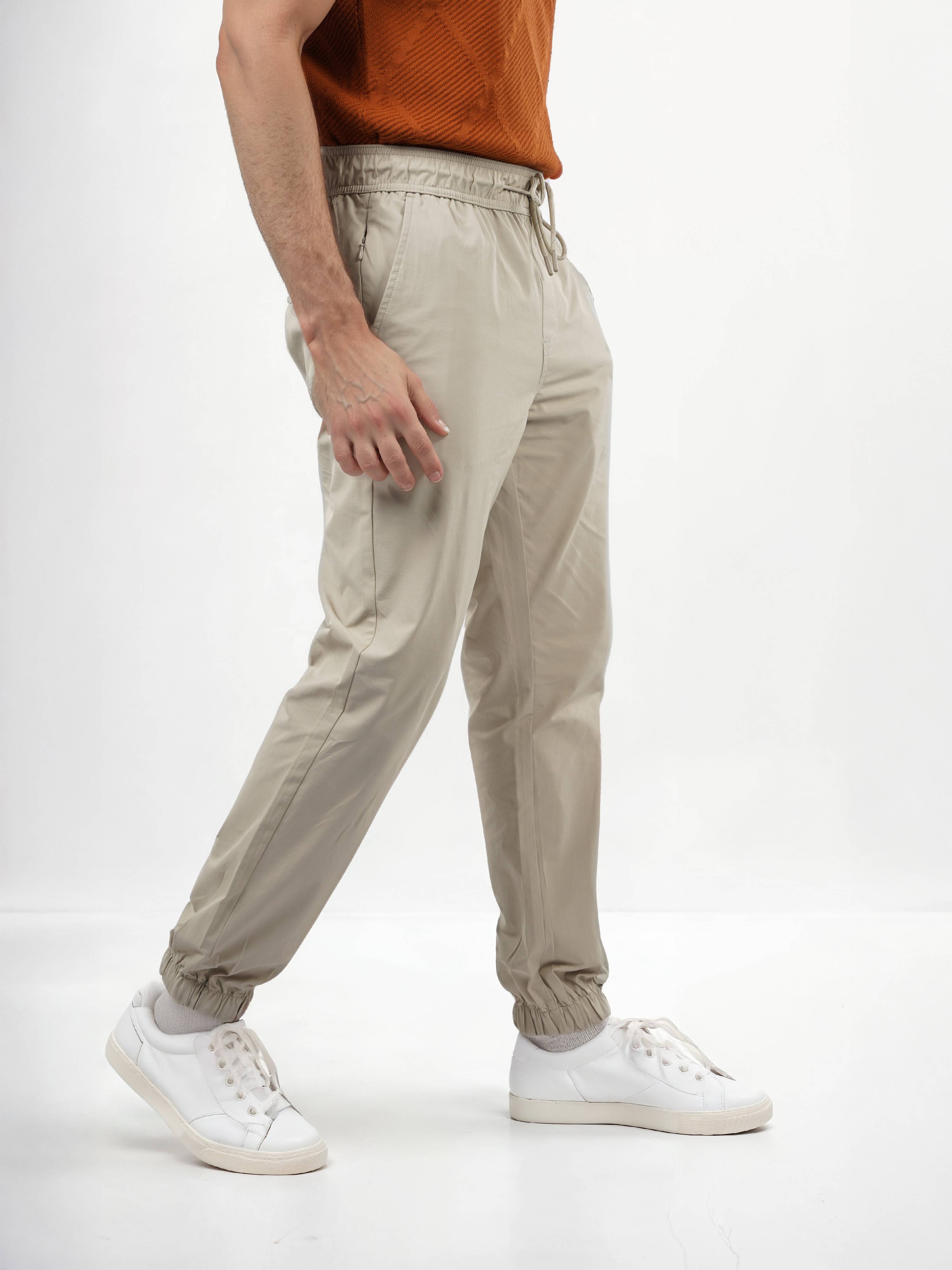 Celio Men Beige Solid Regular Fit Cotton Trousers