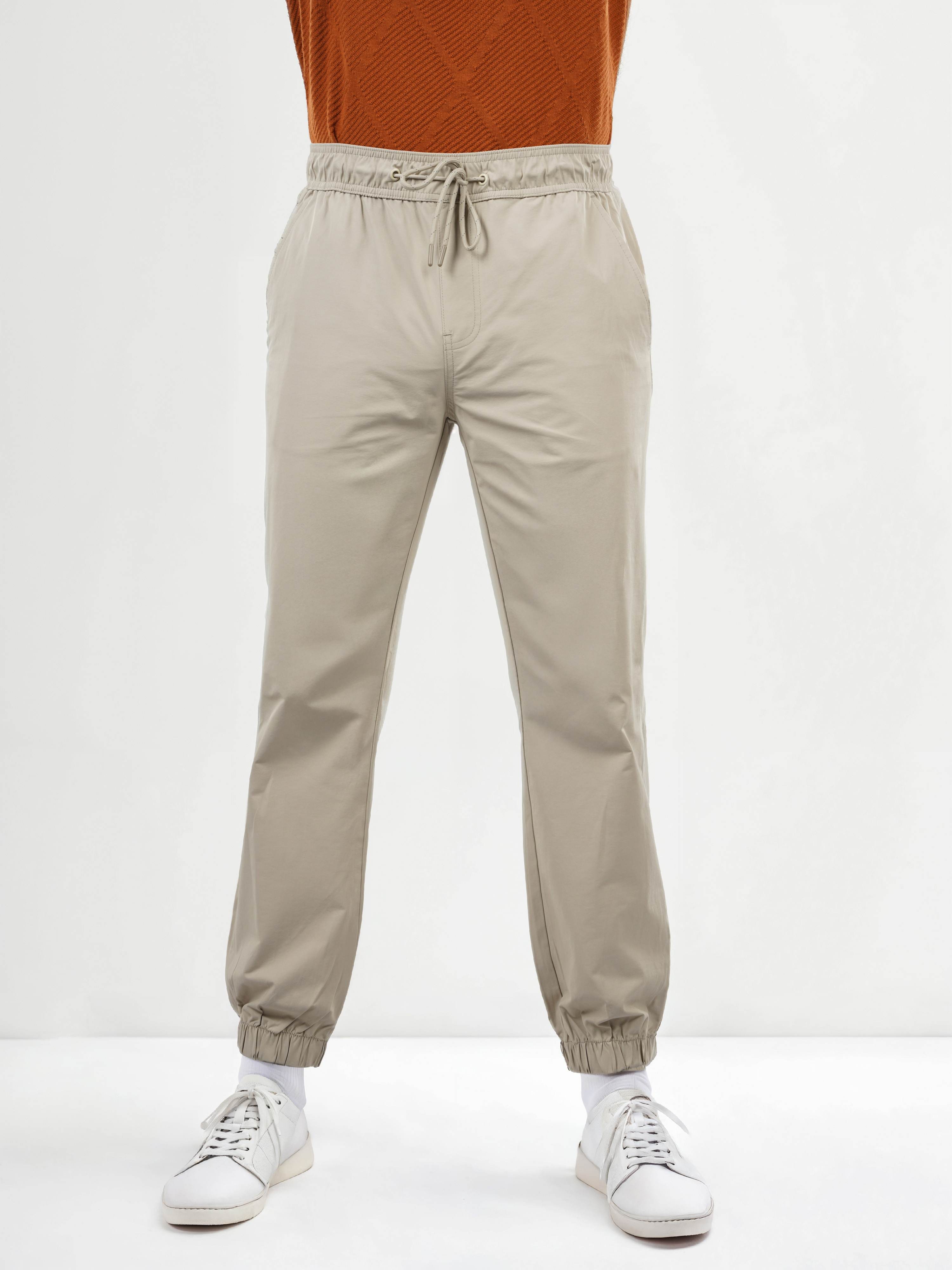 Celio Men Beige Solid Regular Fit Cotton Trousers