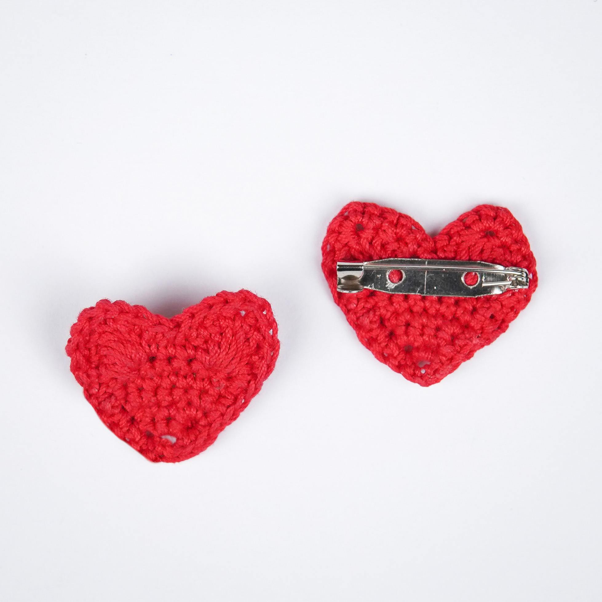  Close-up of the intricate details and rich red color of the Red Heart Brooch by A Handcrafted Gaatha