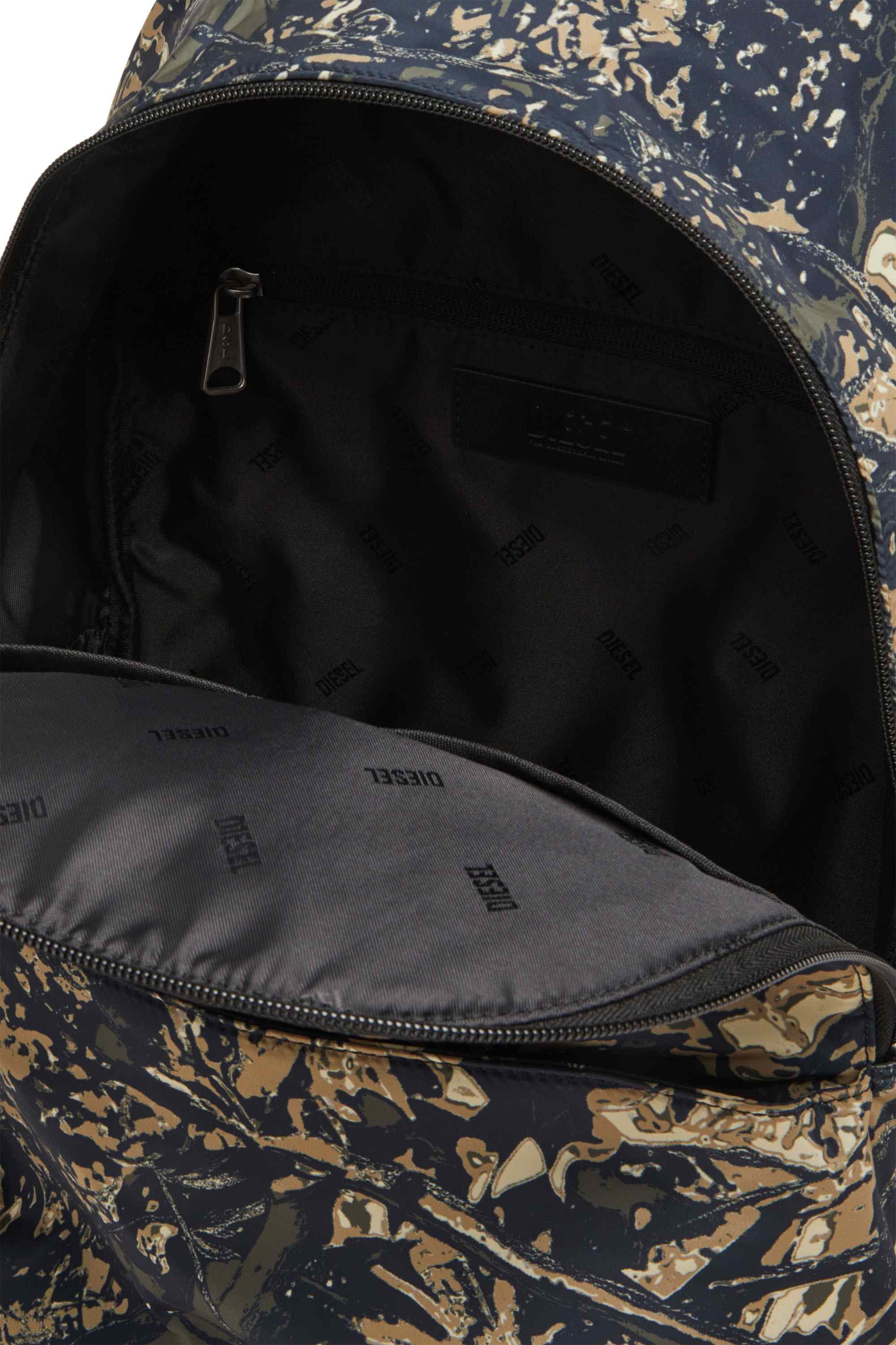 Green D-Pack-Backpack in camo-print fabric