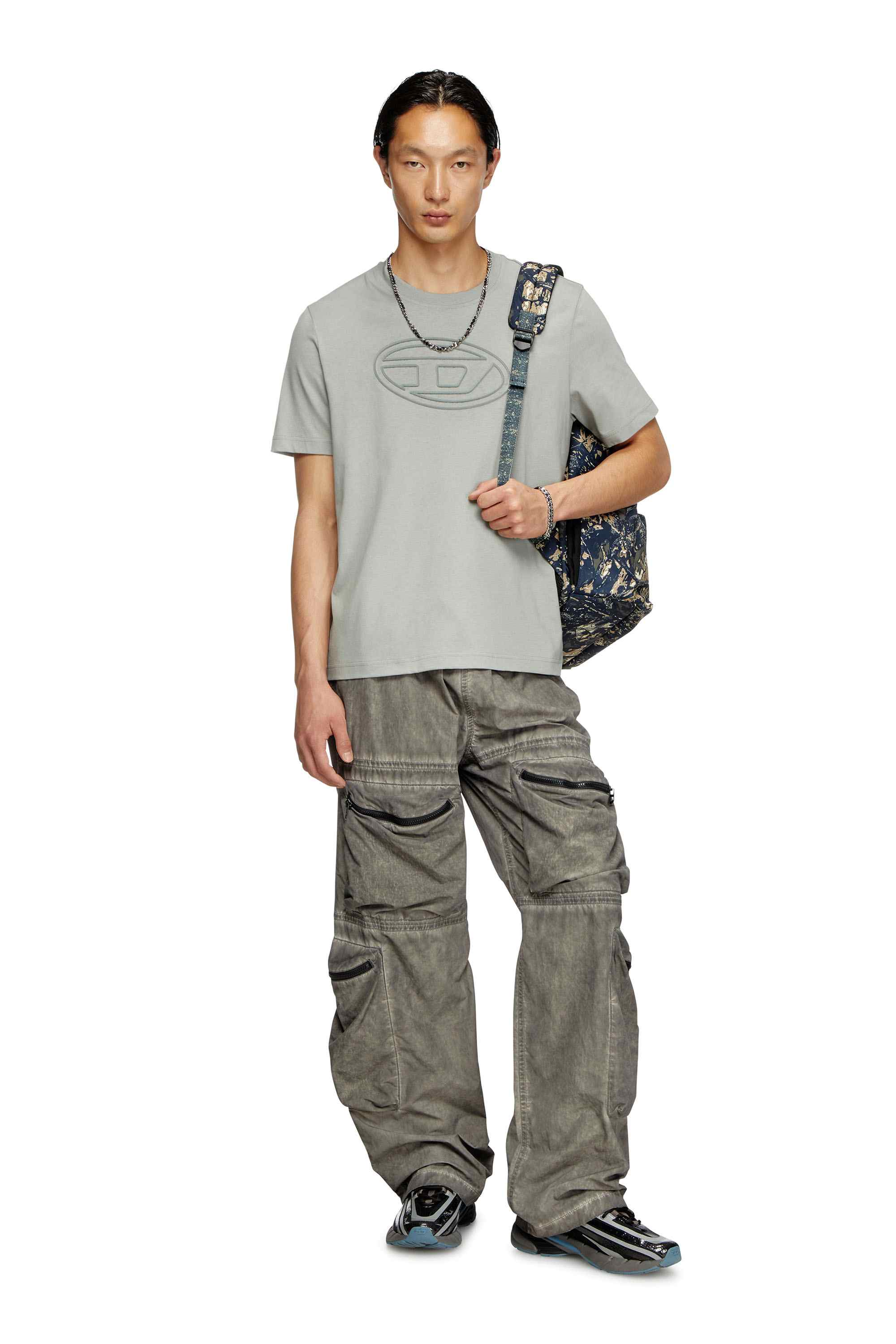 Green D-Pack-Backpack in camo-print fabric