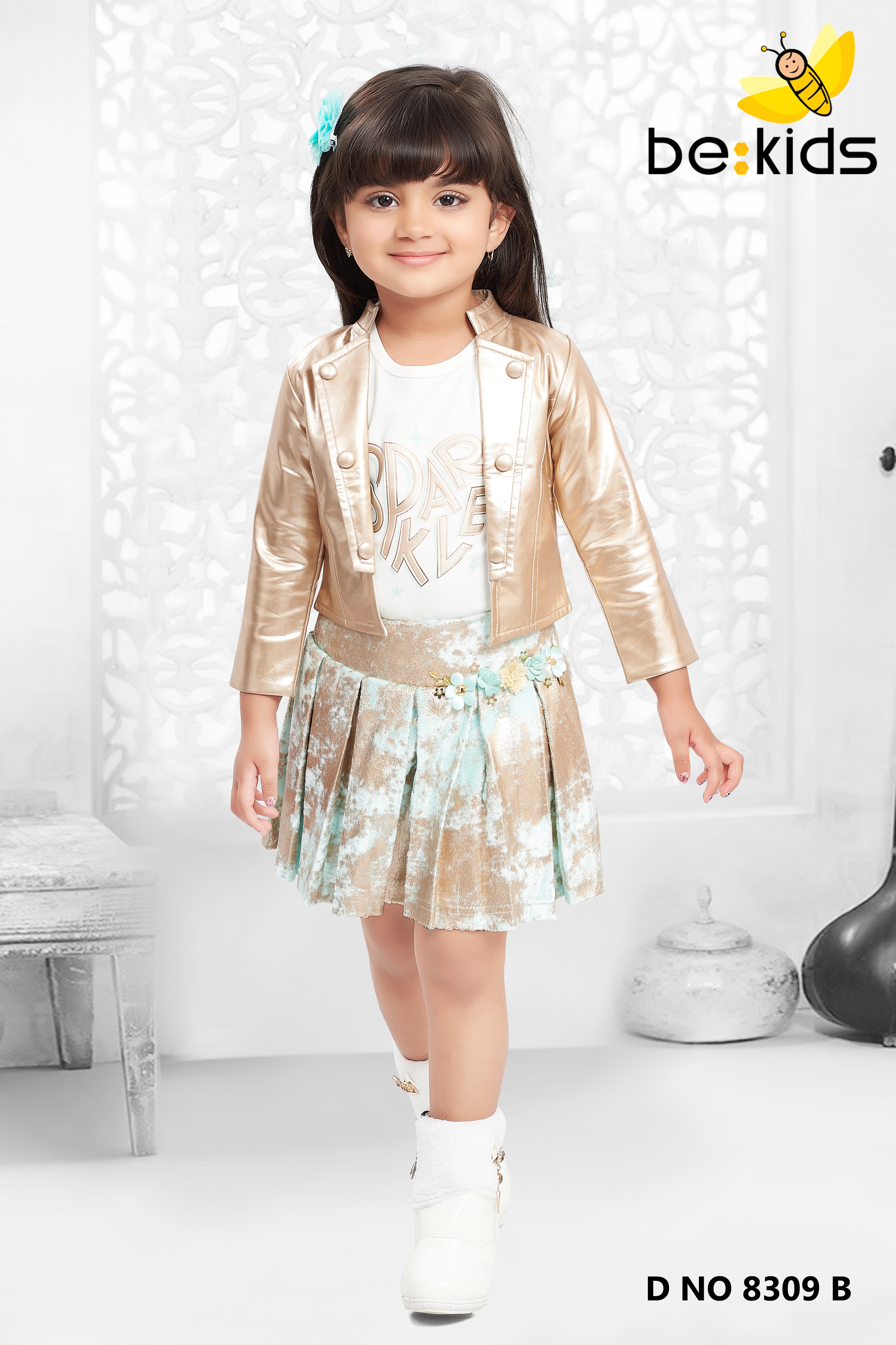 Smart Printed Top With Shining Green Skirt And Leather Jacket