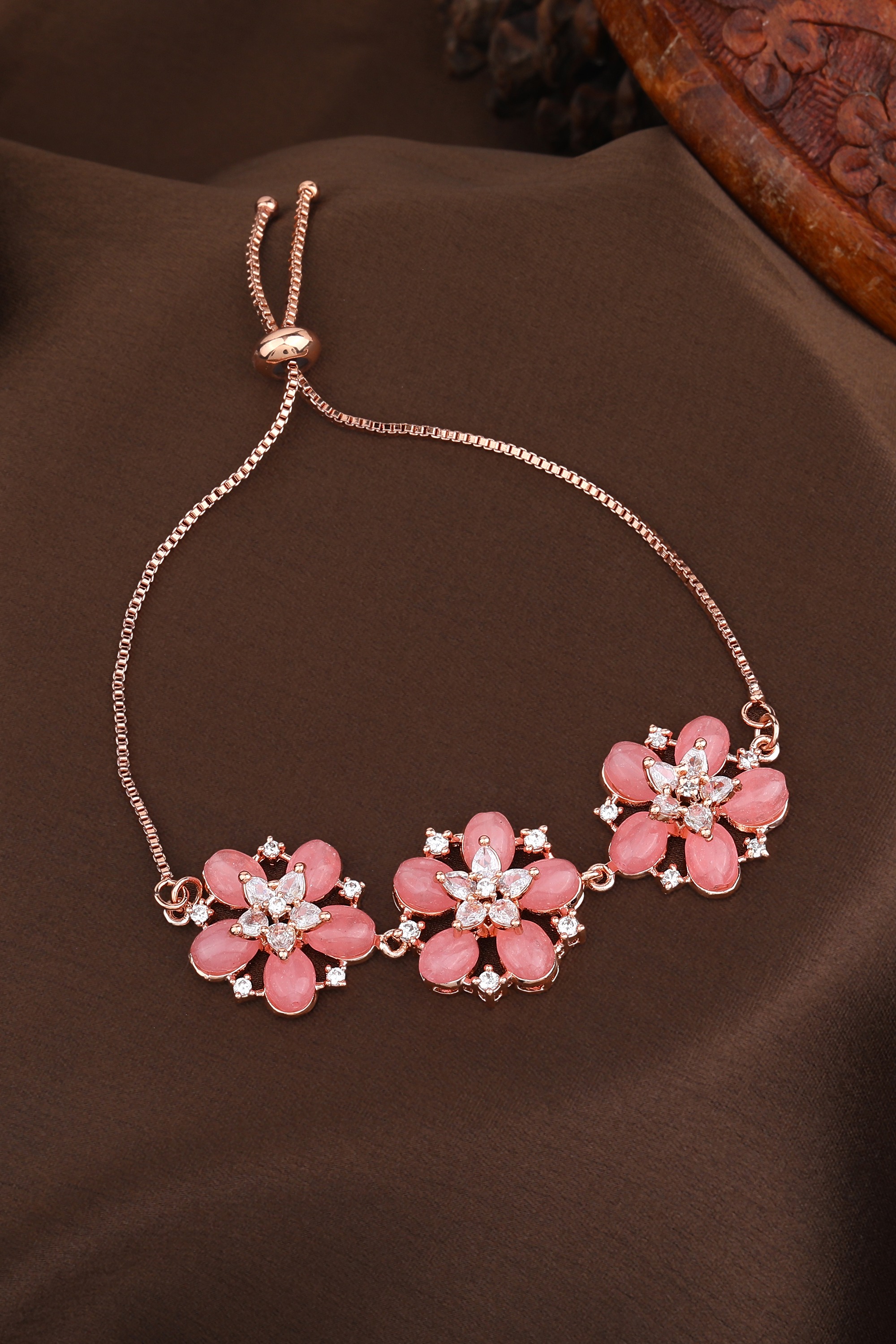 Estele Rosegold Plated Blossom Motifs Enhanced Lightweight Adjustable Charm Bracelet with Mint Pink Beads for Women