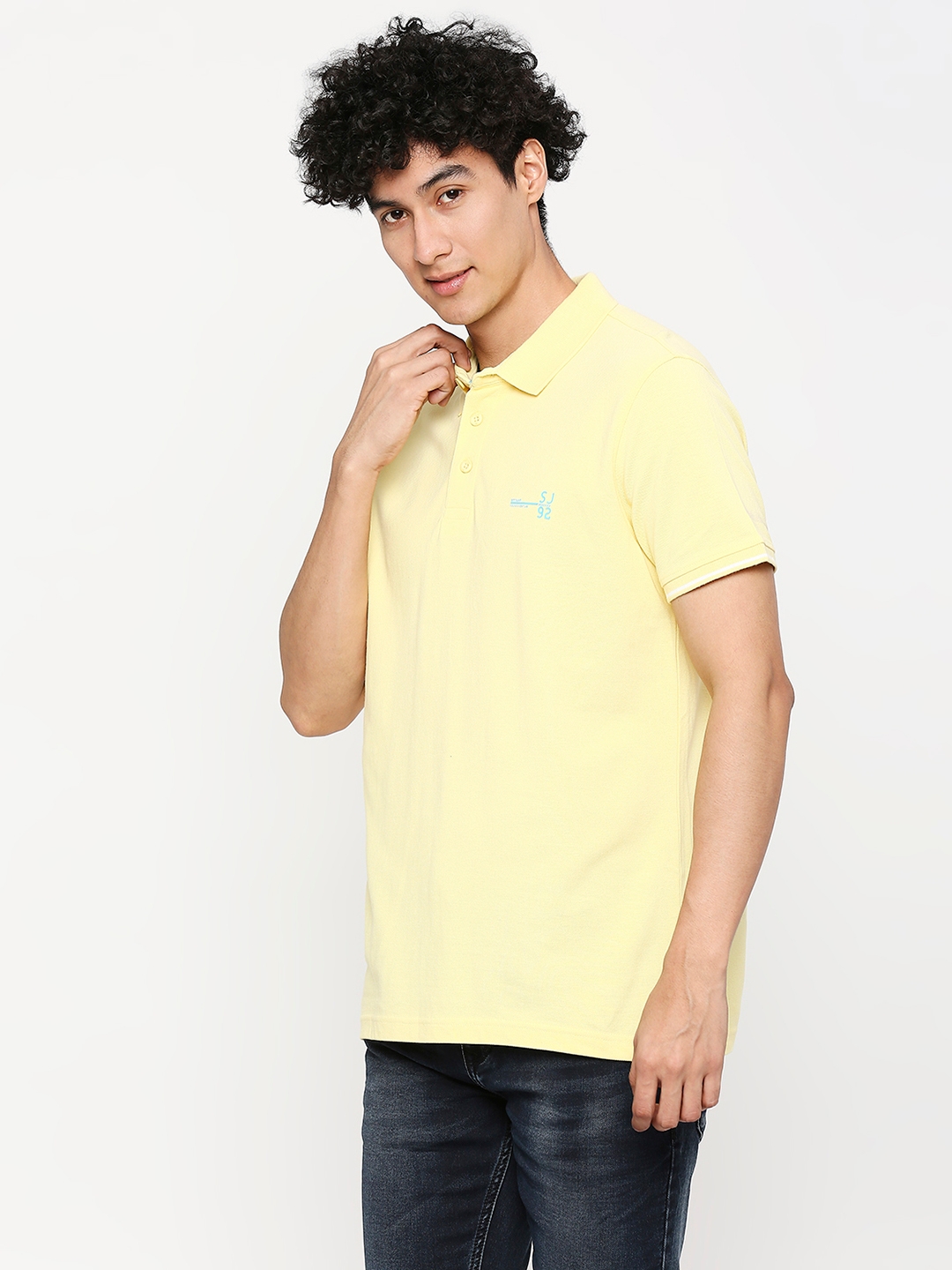 Spykar | Spykar Men Butter Yellow Cotton Slim Fit Plain Polo Neck Tshirt 1
