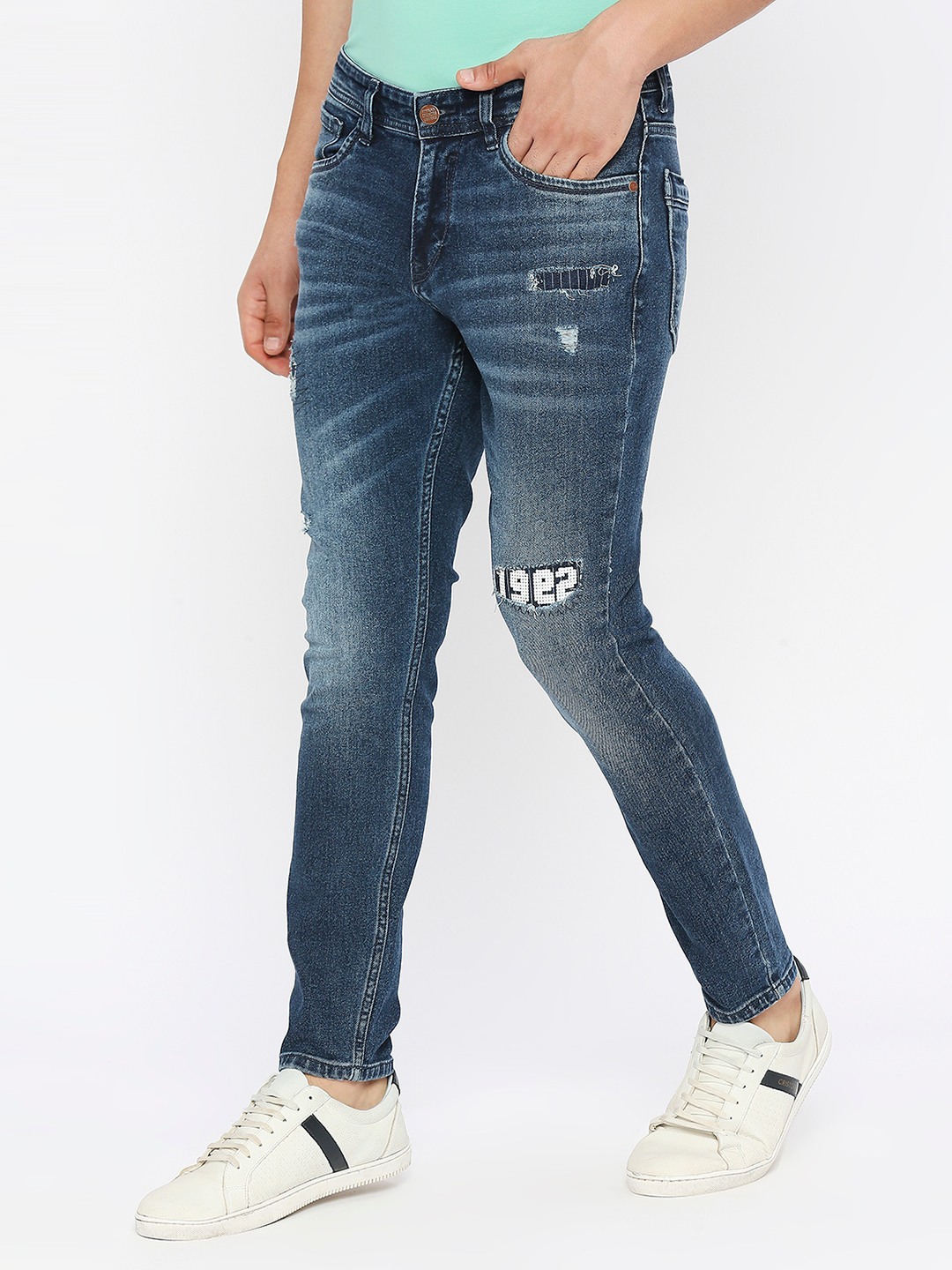 Spykar Men Dark Blue Cotton Slim Fit Tapered Length Mildly Distressed Mid Rise Jeans-(Kano)