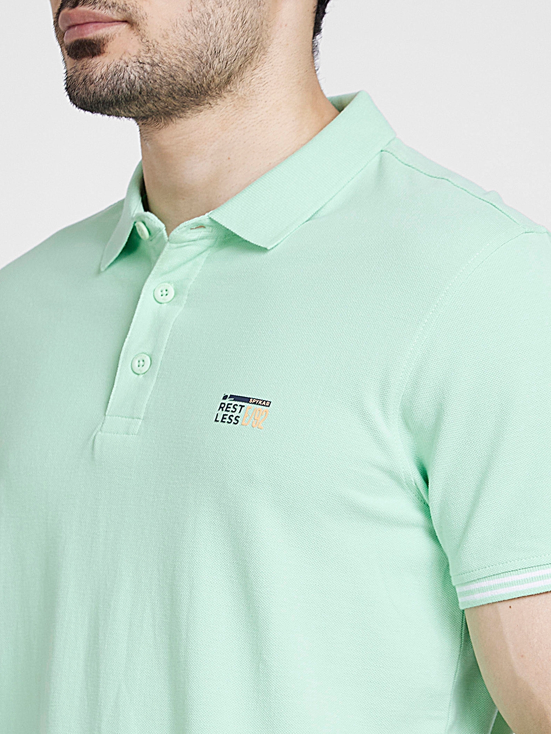 spykar | Spykar Men Mint Green Cotton Slim Fit Plain Polo Tshirt 4