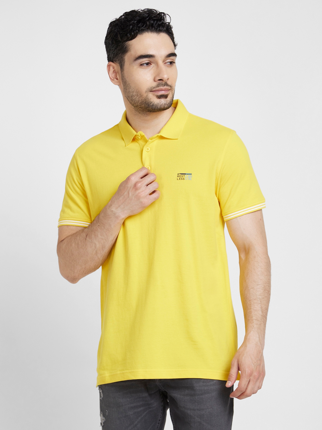 spykar | Spykar Men Yellow Cotton Slim Fit Plain Polo Tshirt 0