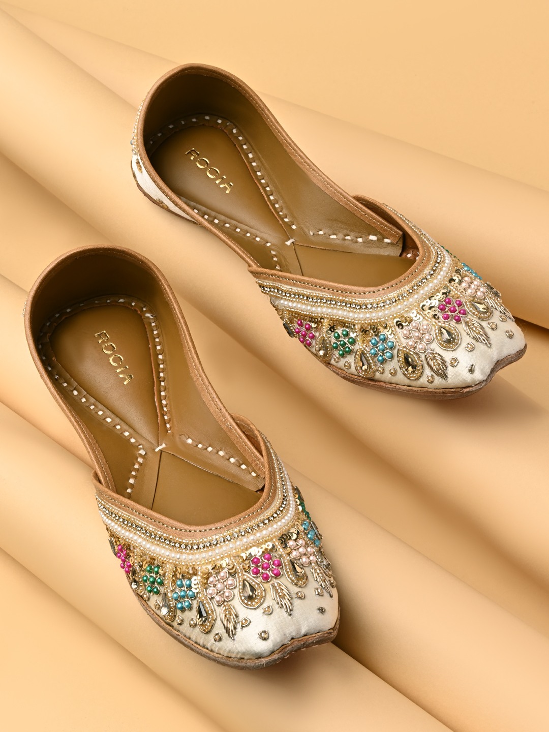 Rocia By Regal Ivory Women Embroidered Juttis