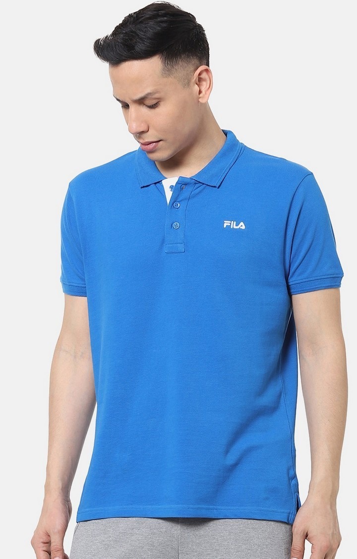Royal blue fila shirt on sale